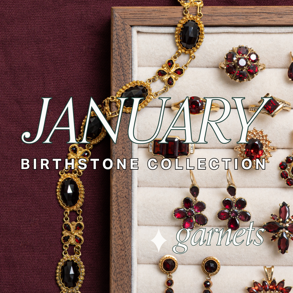 Vintage garnet jewellery with deep red gemstones, styled for January birthstone collection.