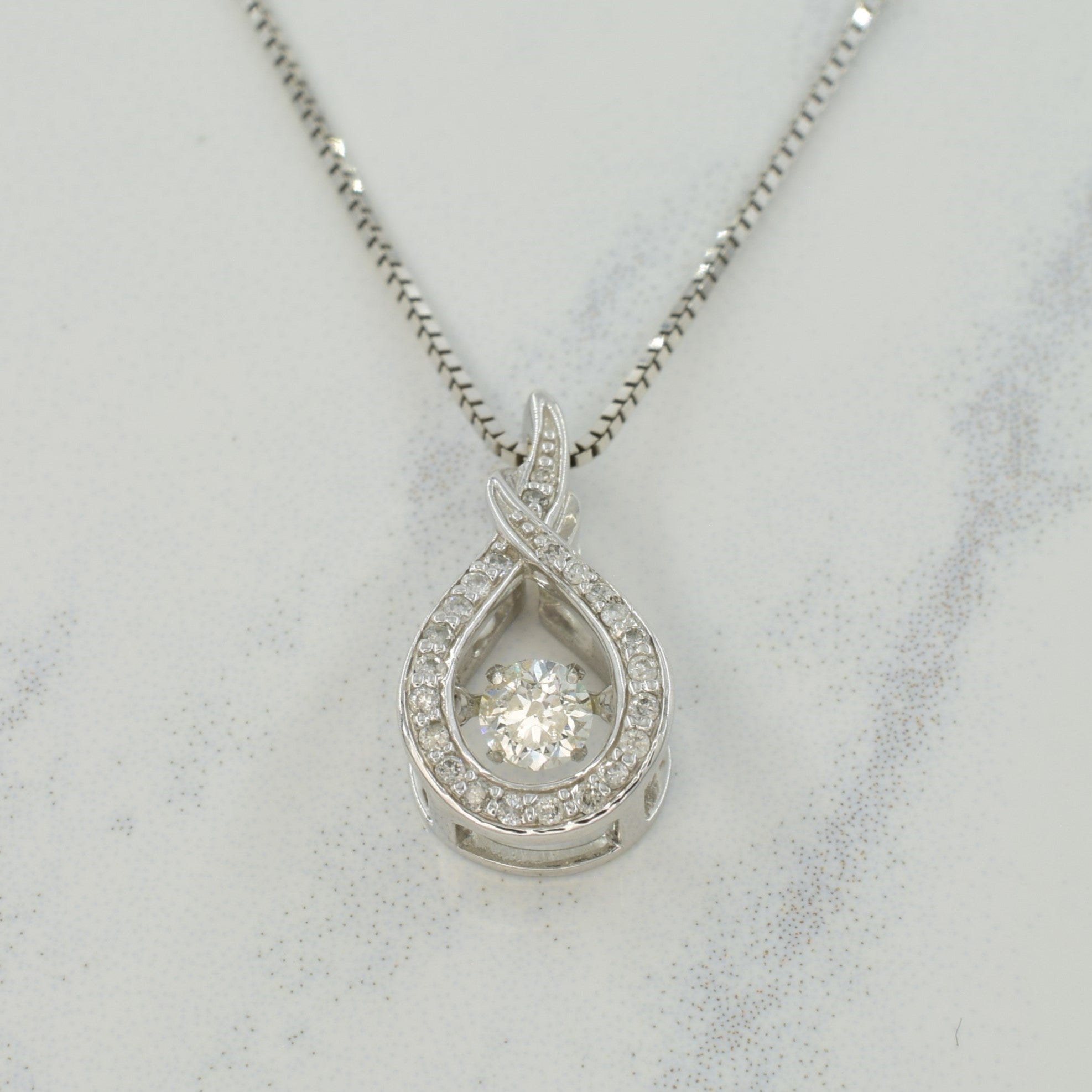 10kt 2024 white gold diamond pendant the center floats