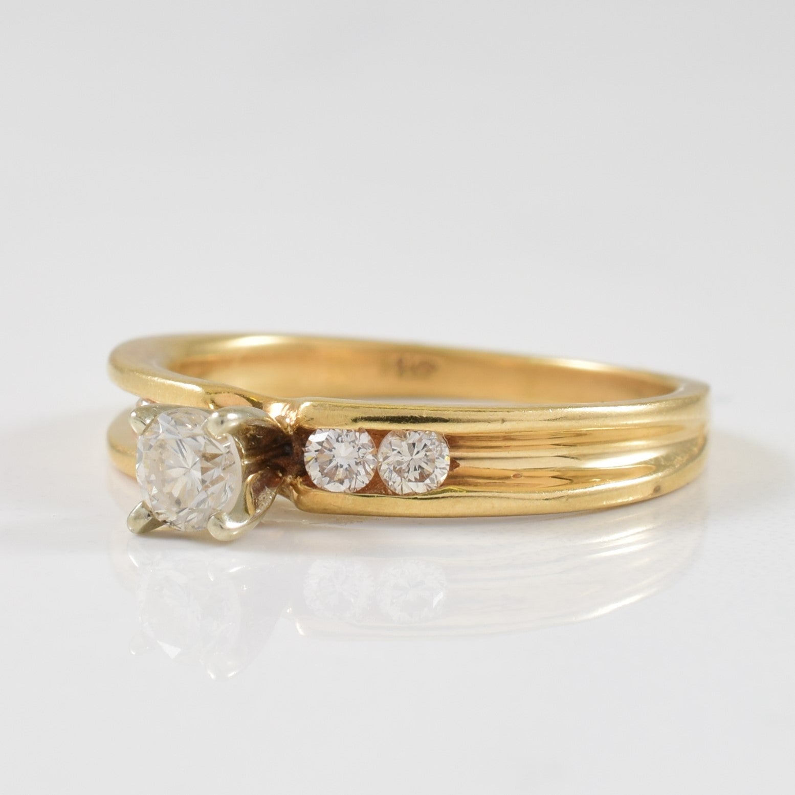 Solitaire Diamond & Channel Set Diamond Ring | 0.32ctw | SZ 5.5 |