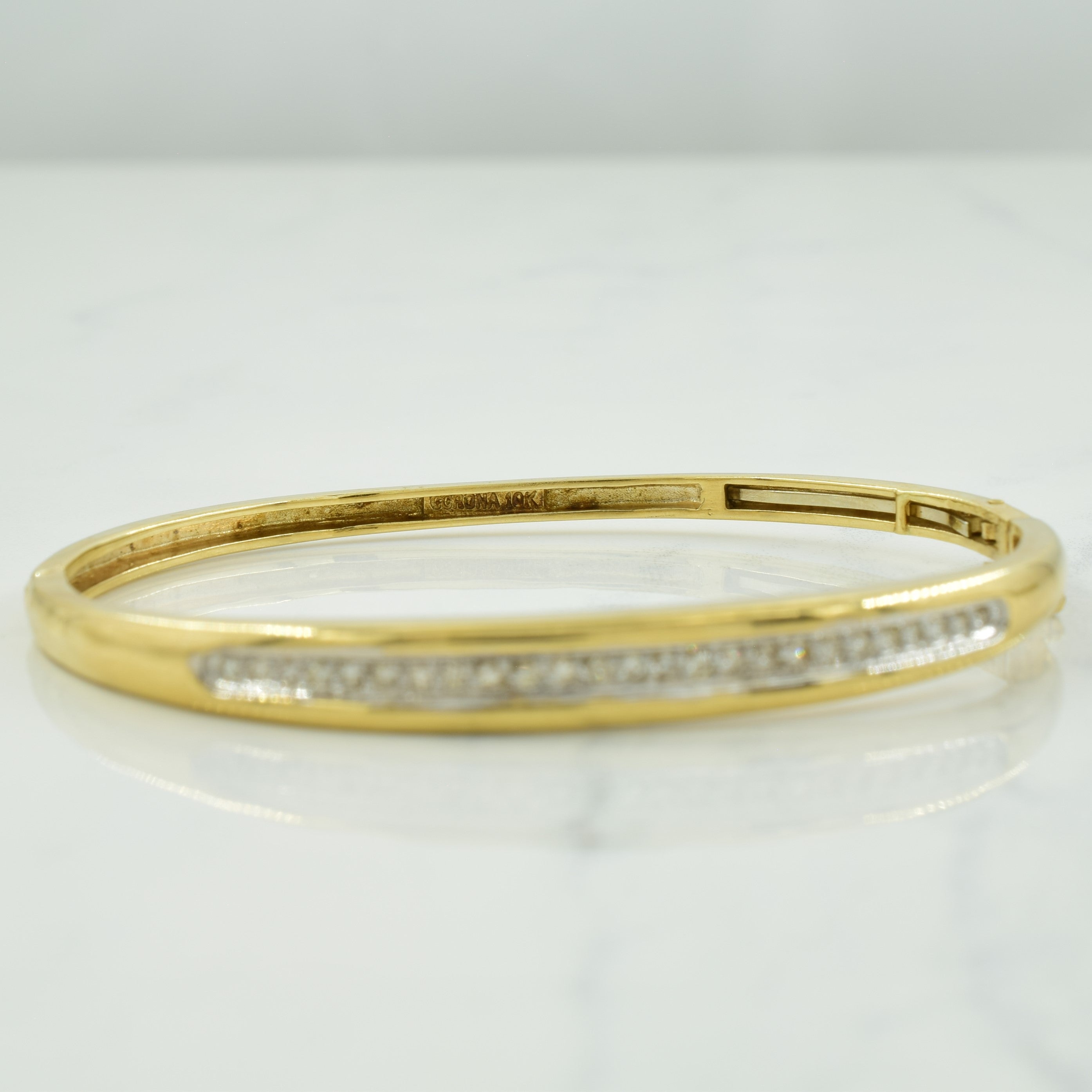 Bracelet jonc en or jaune 10 carats et diamants | 0,25 ct | 7,25" |