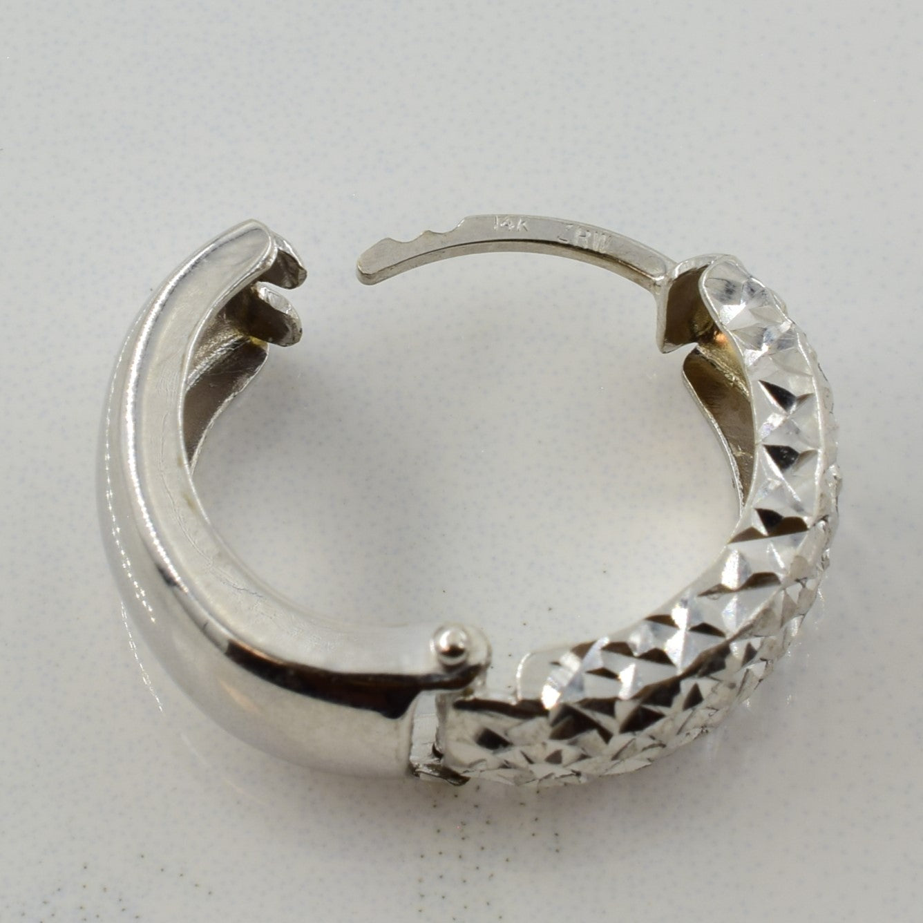 14k White Gold Textured Huggie Earrings |