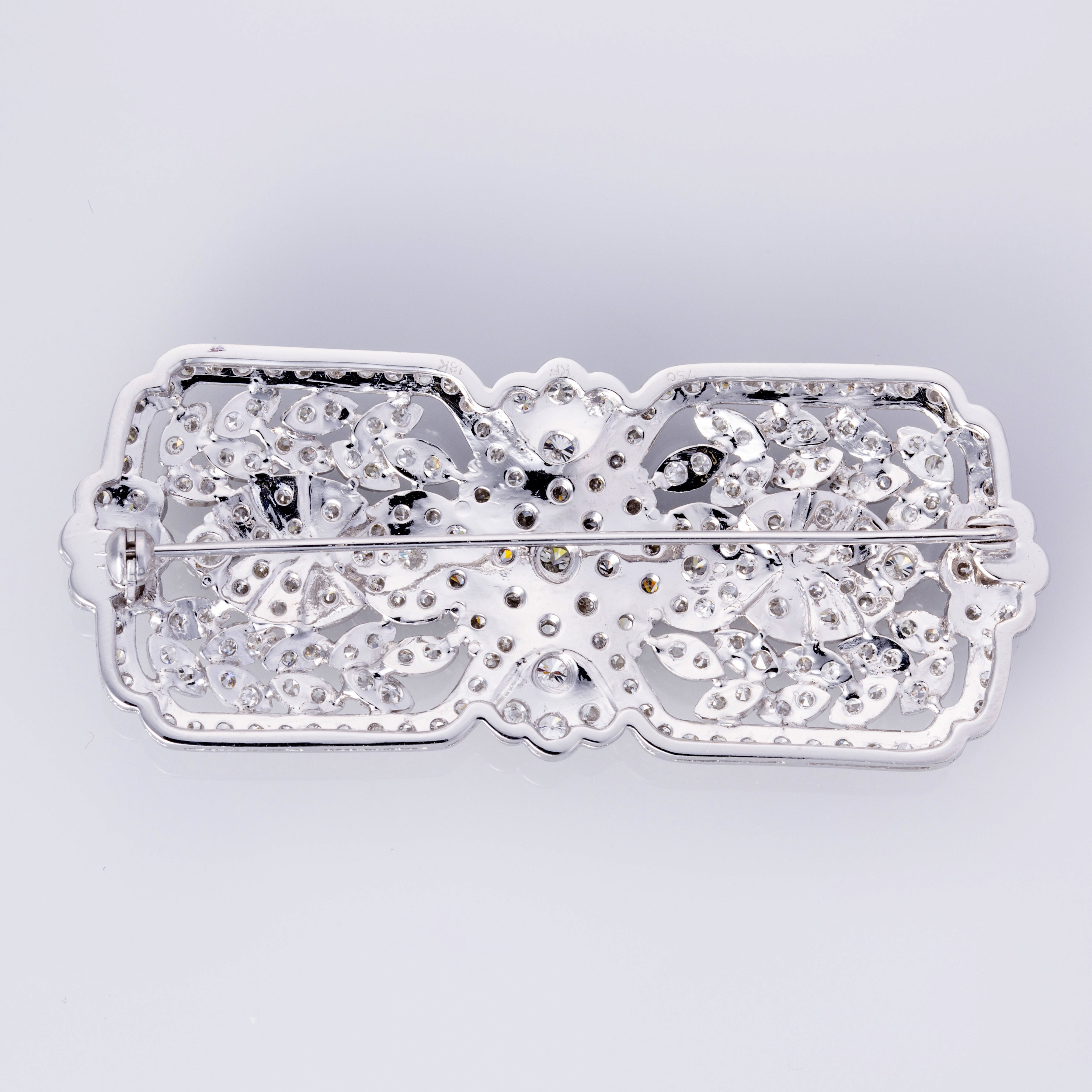 Broche en or blanc 18 carats et diamants | 6,07 ct au total
