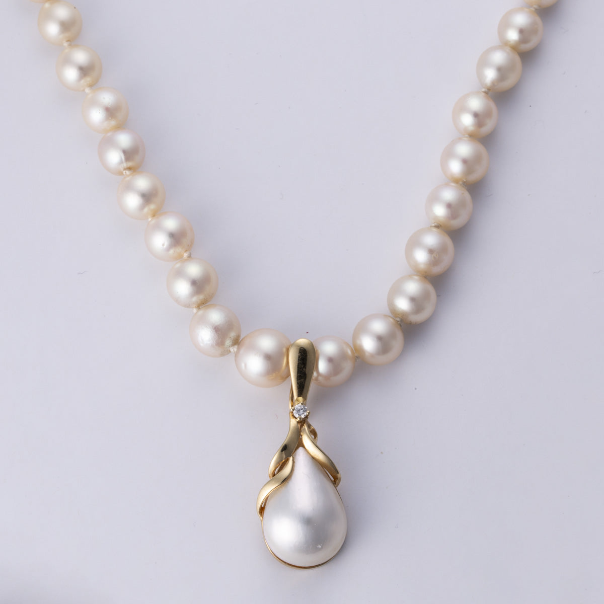 Collier en or jaune 14 carats, perle et diamant | 0,04 ct | 49,5 cm