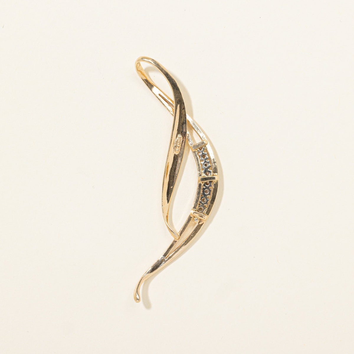 14k Diamond Accented Wave Cross Over Pendant | 0.38ctw