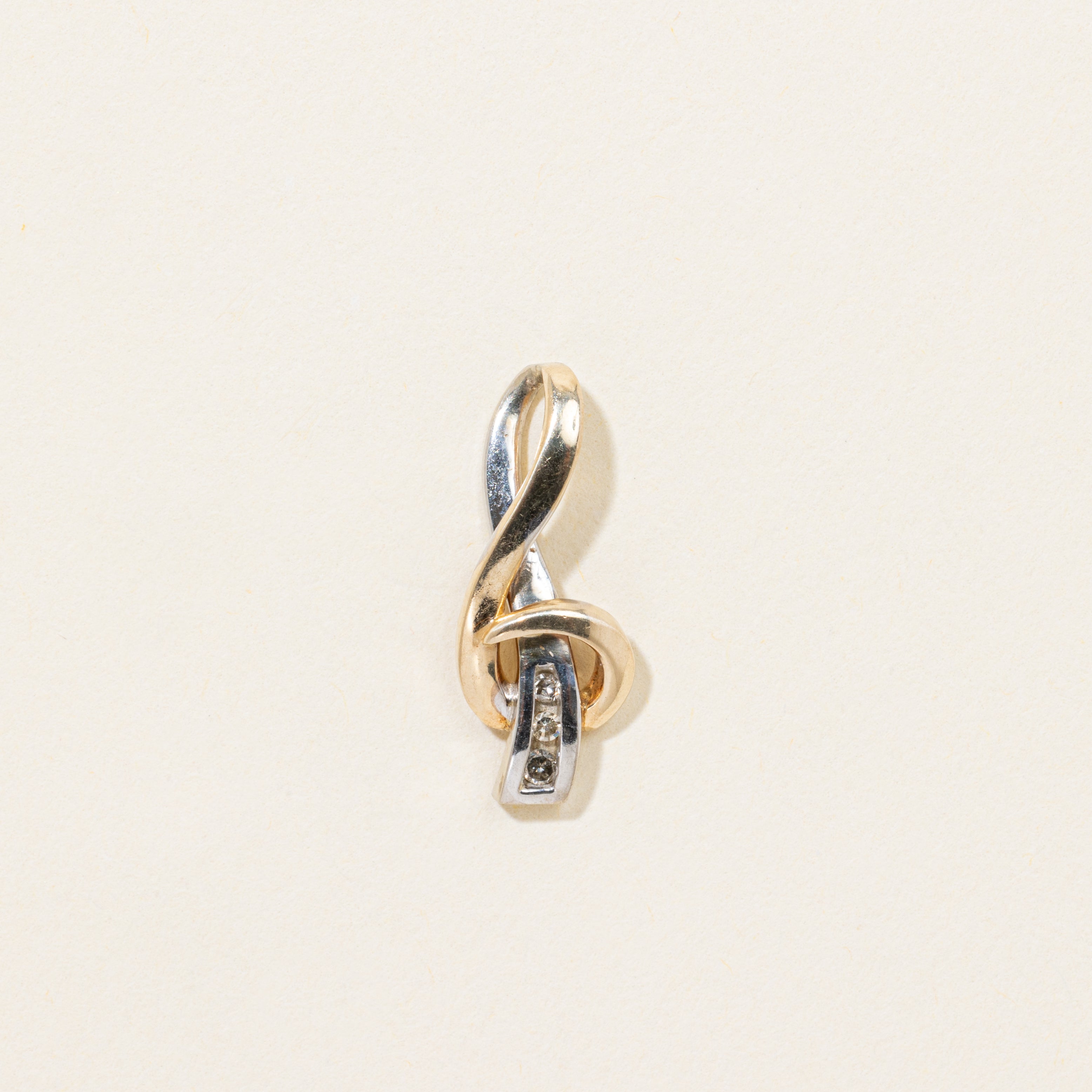 10k Two Tone Gold Diamond Swirl Pendant