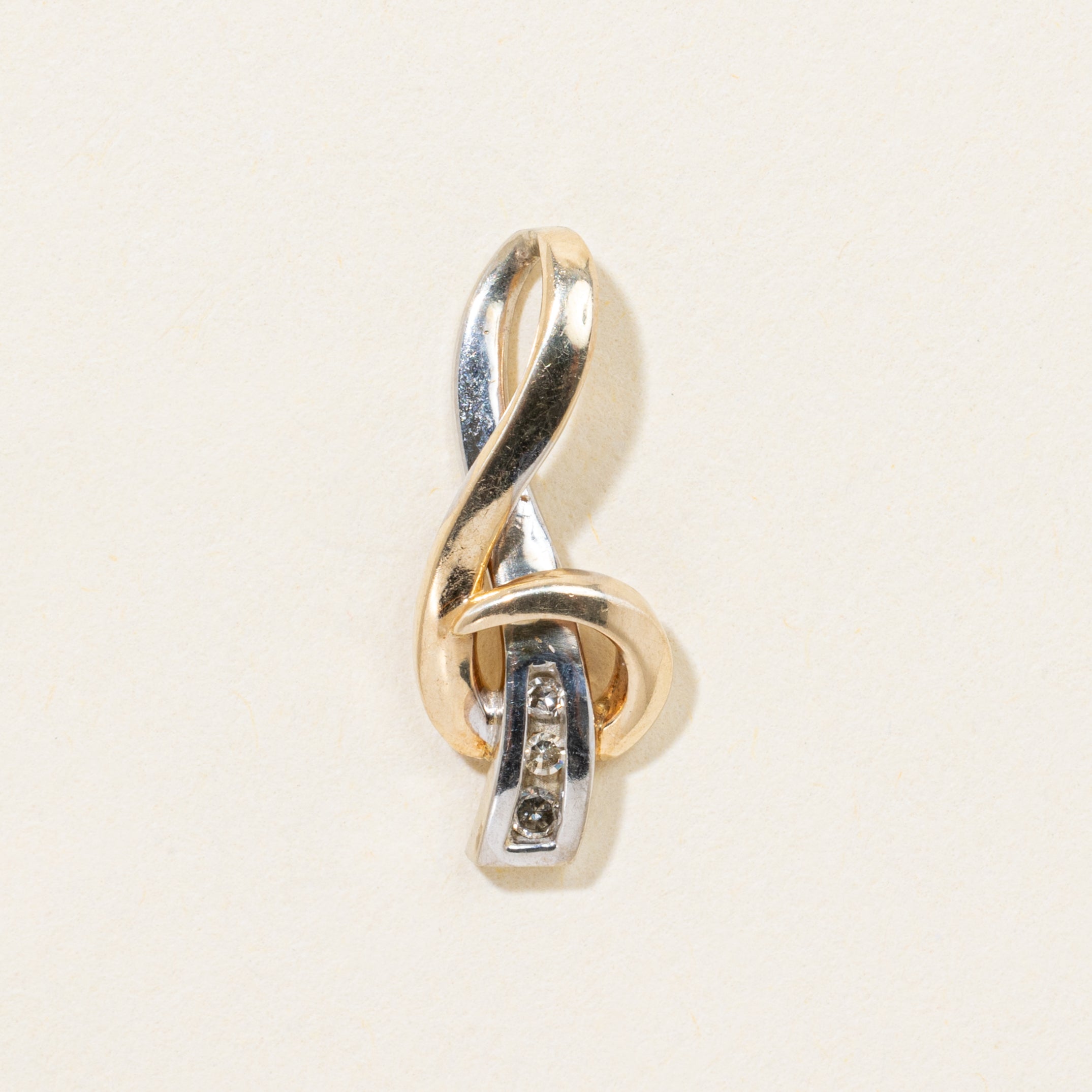 10k Two Tone Gold Diamond Swirl Pendant