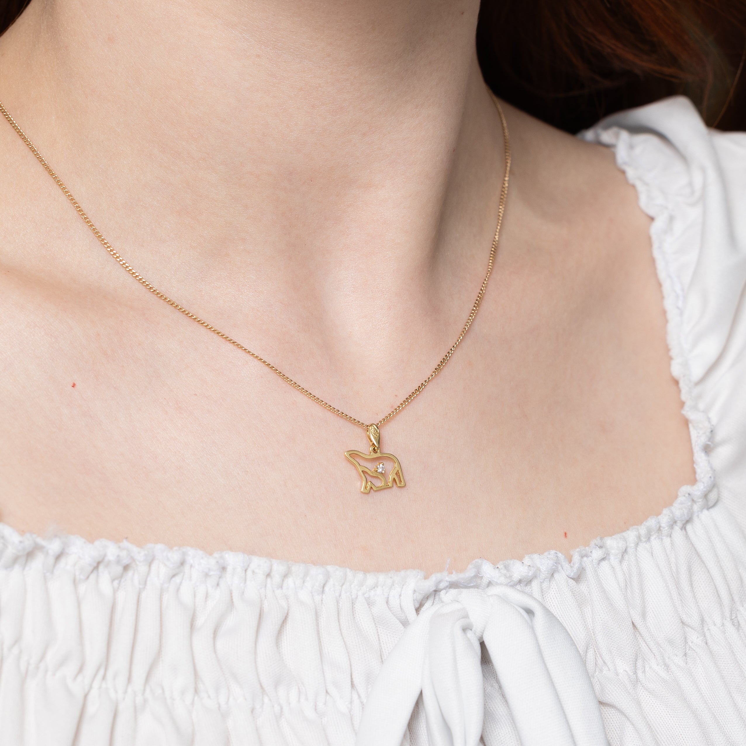 Pendentif ours et son ourson en or 14 carats et diamants