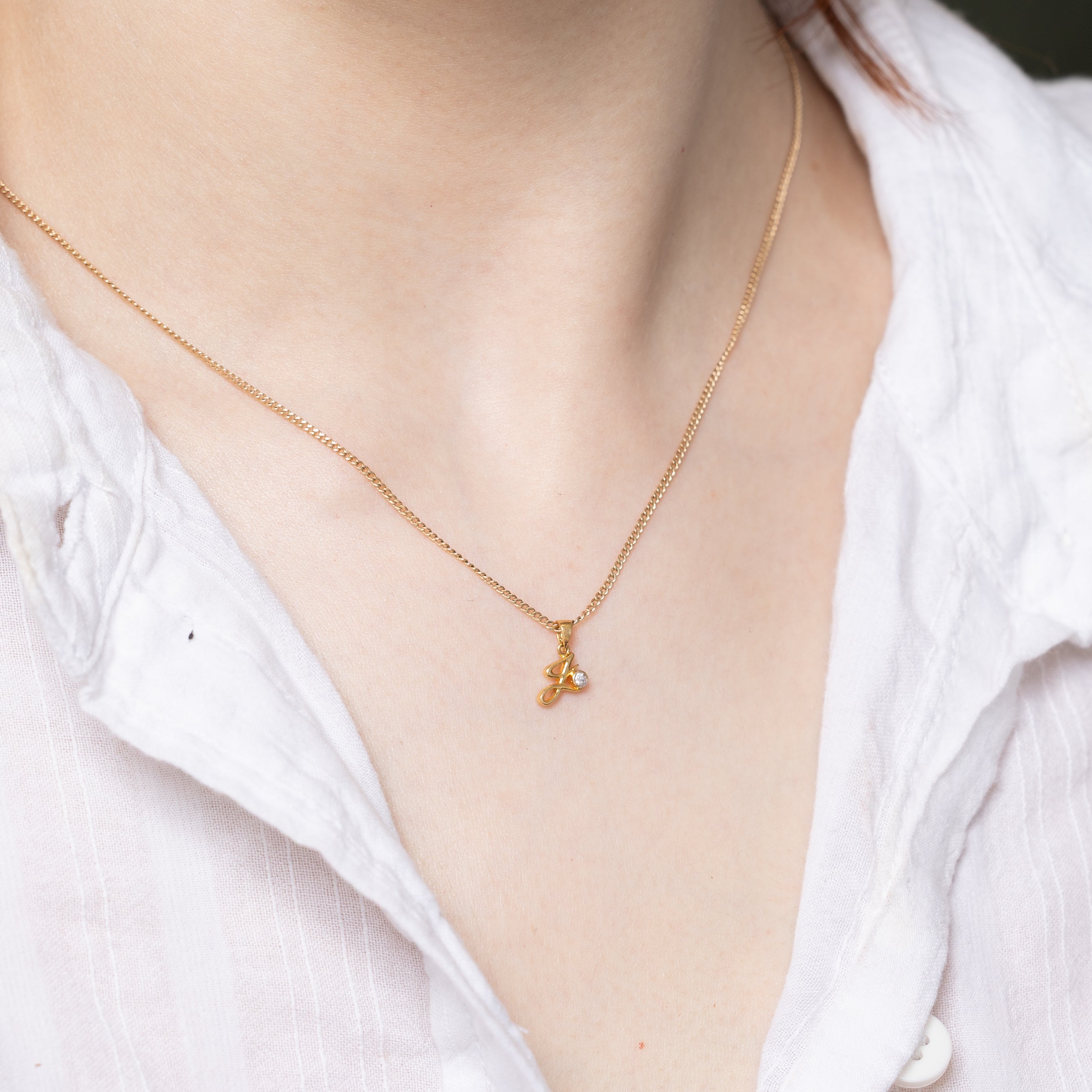 Pendentif initial « J » en diamant 20 carats