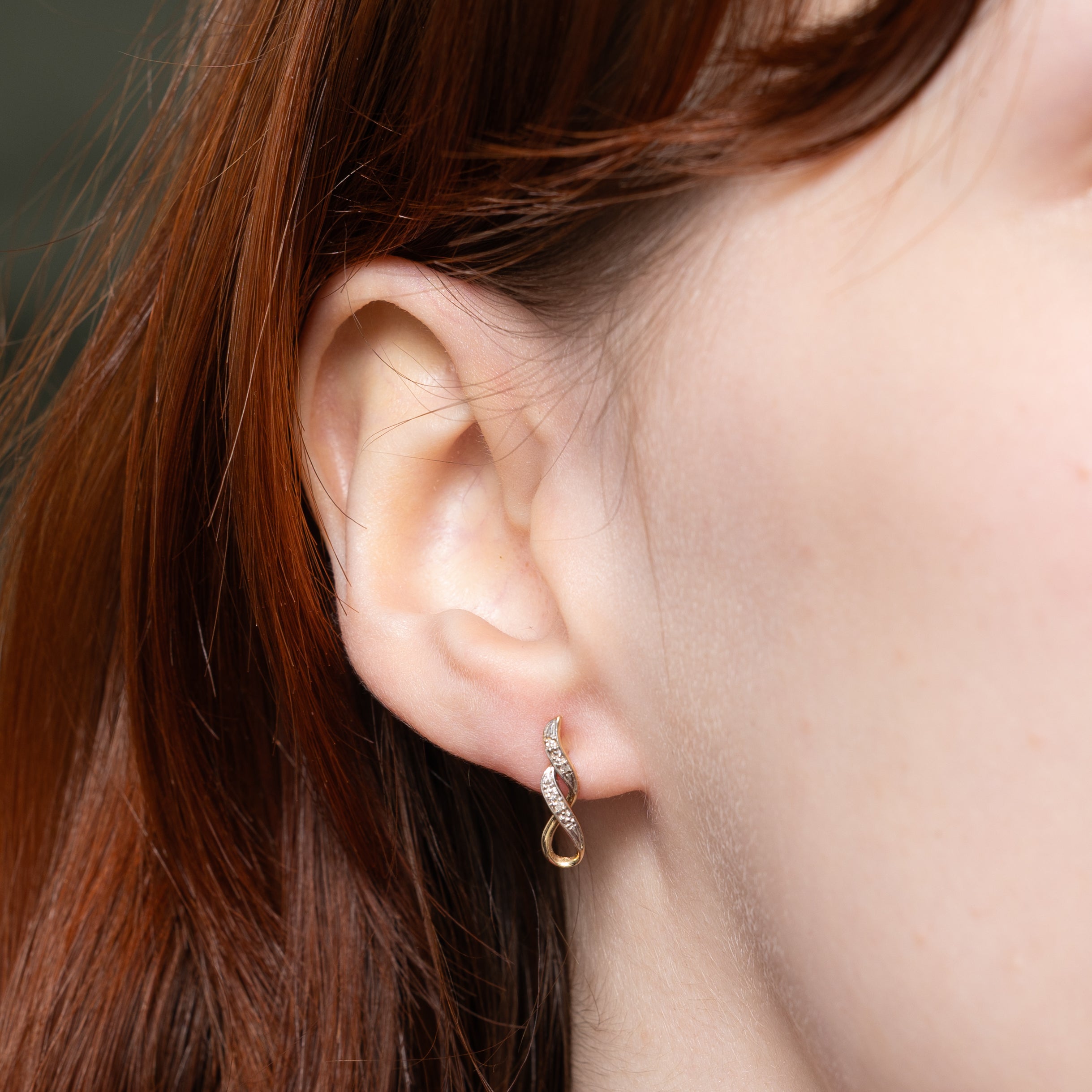 10k Diamond Cross Over Stud Earrings