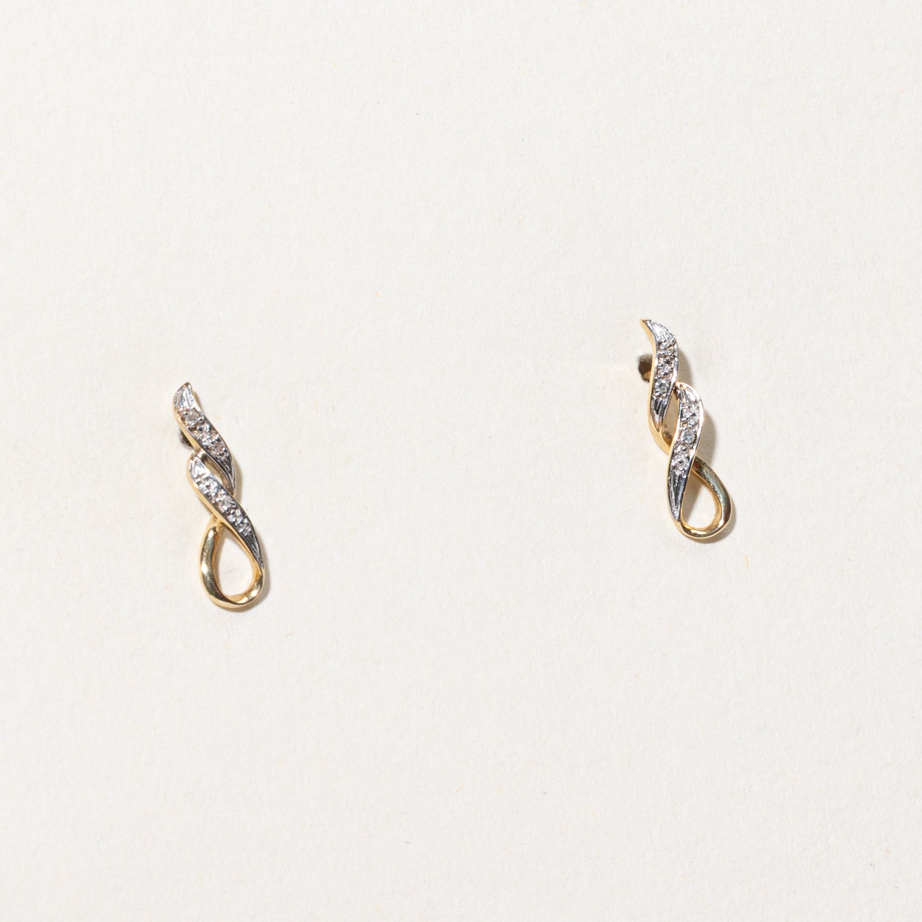 10k Diamond Cross Over Stud Earrings