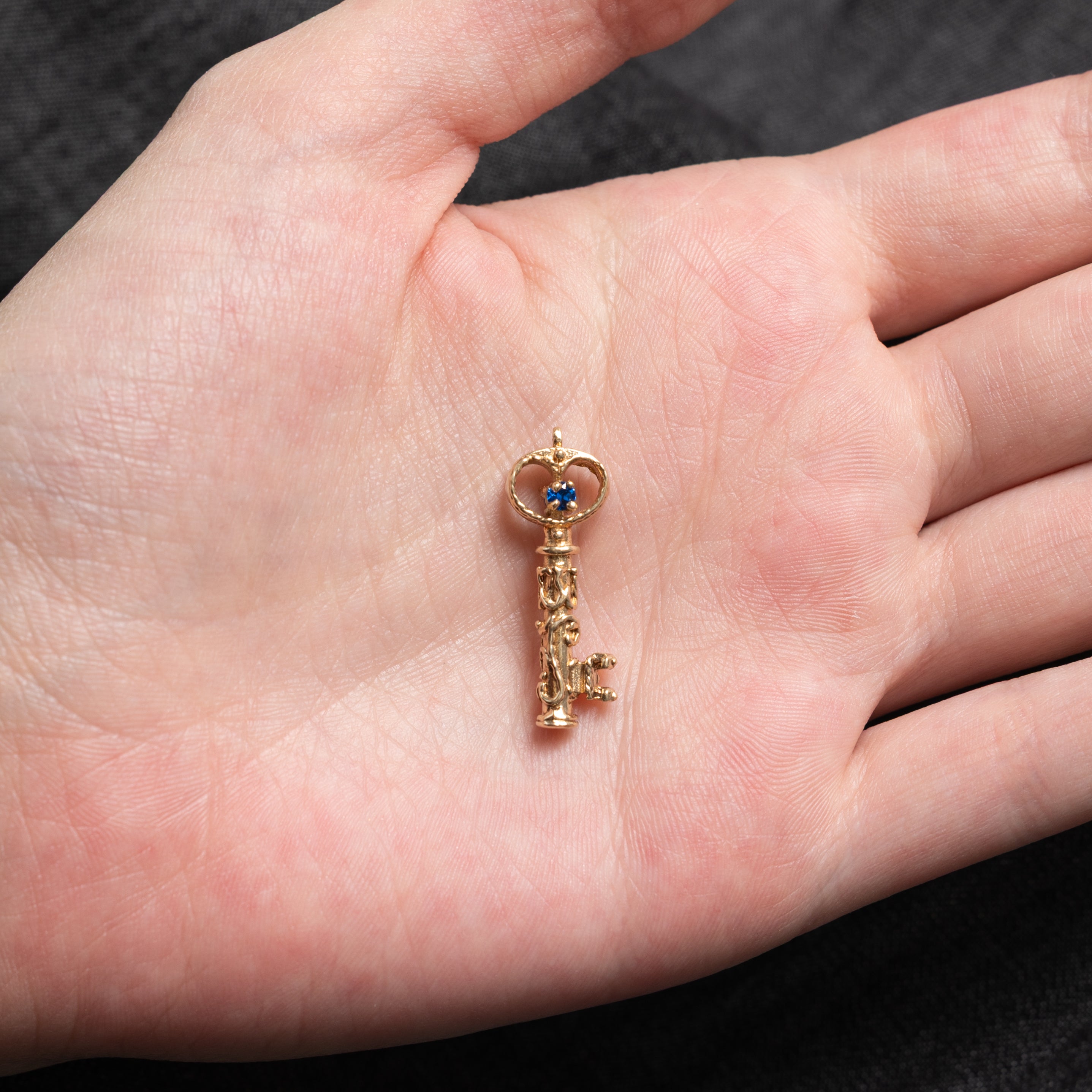 14k Synthetic Spinel Ornate Key Pendant | 0.04ctw