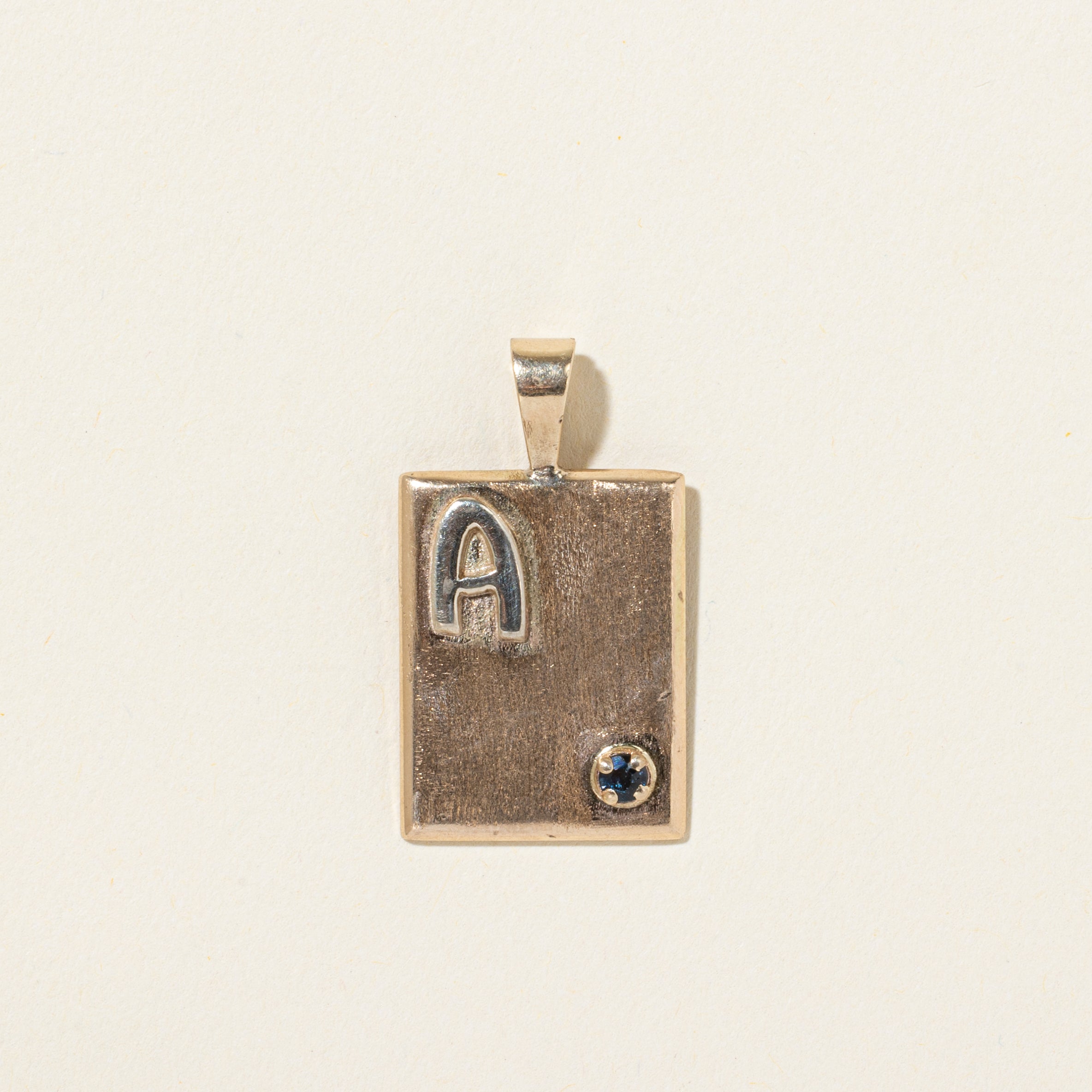 10k Sapphire "A" Initialized Sheet Pendant | 0.09ct