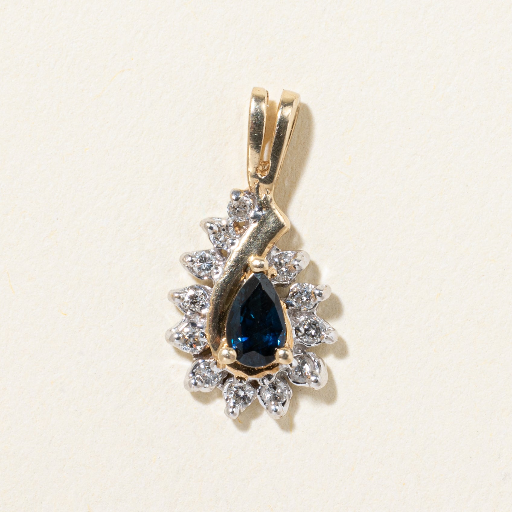 10k Pear Cut Sapphire & Diamond Halo Pendant