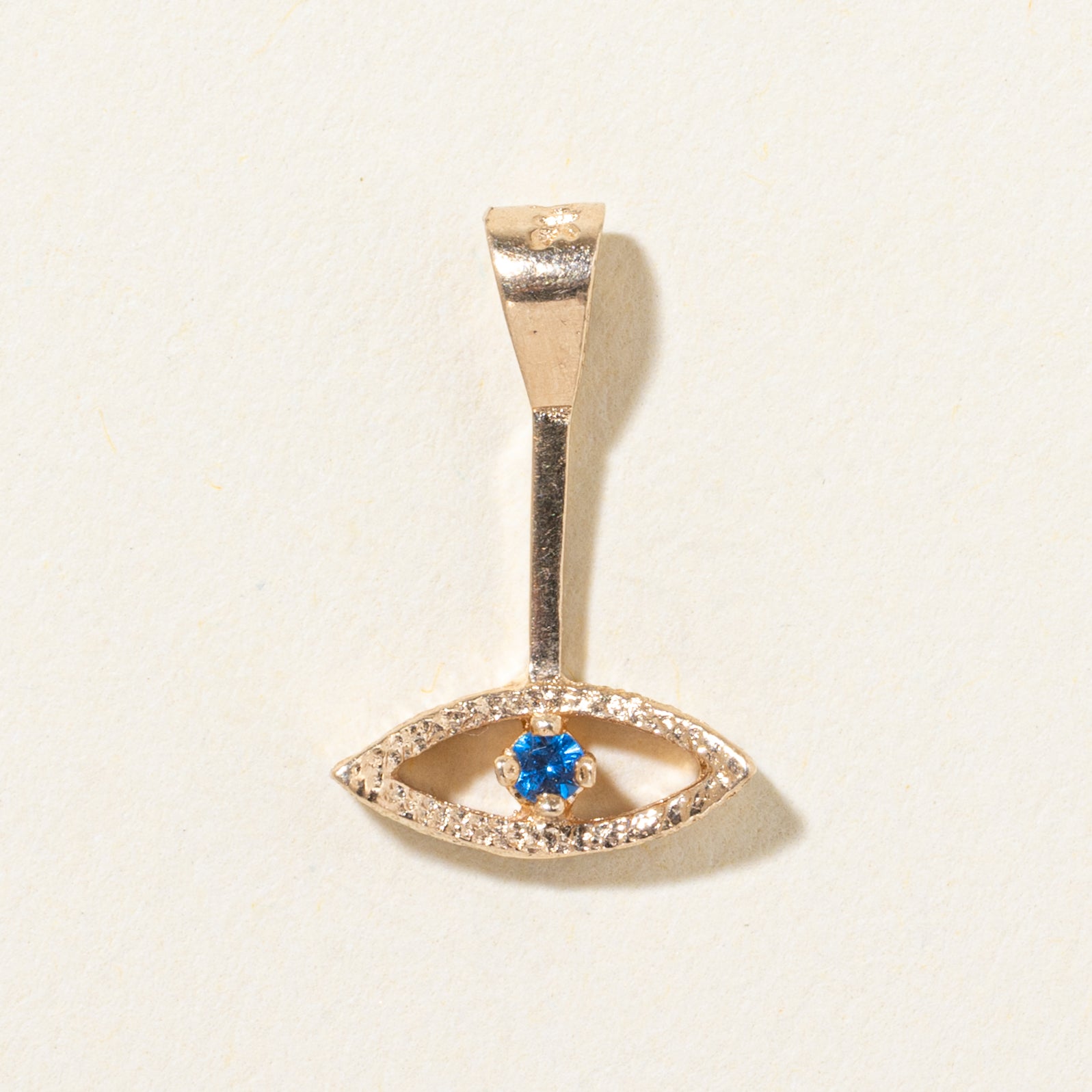 Pendentif œil en spinelle synthétique 10 carats | 0,01 ct
