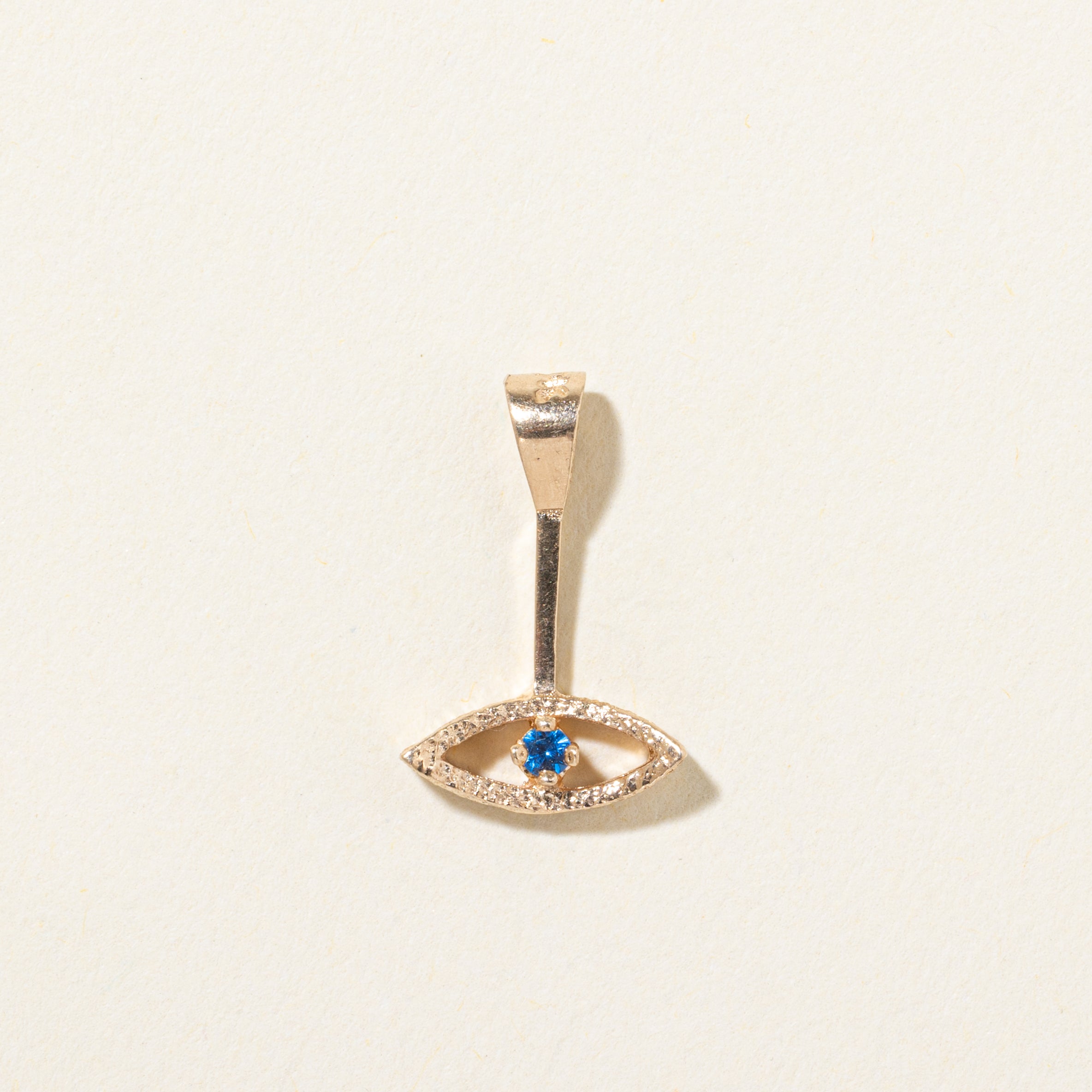 Pendentif œil en spinelle synthétique 10 carats | 0,01 ct