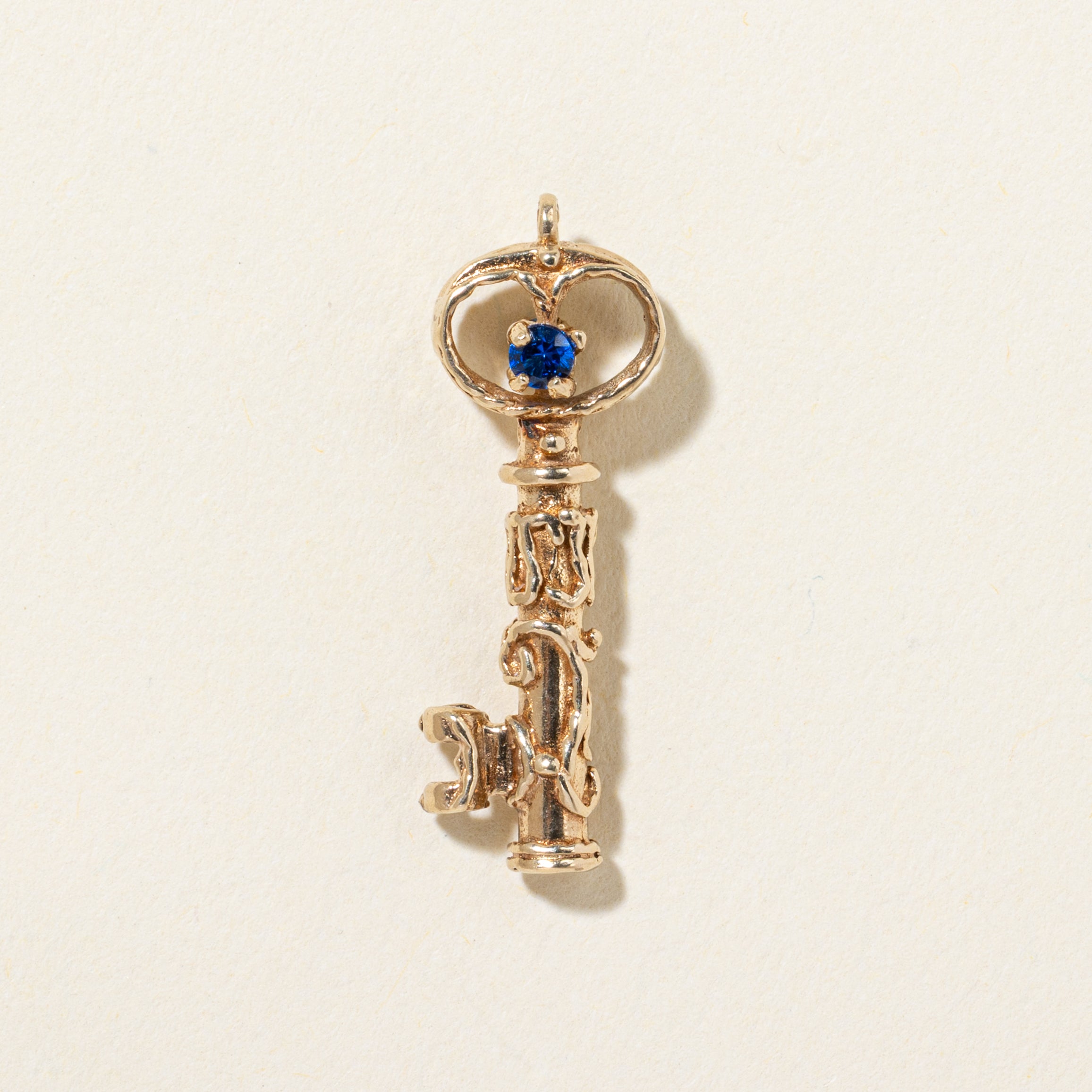 14k Synthetic Spinel Ornate Key Pendant | 0.04ctw