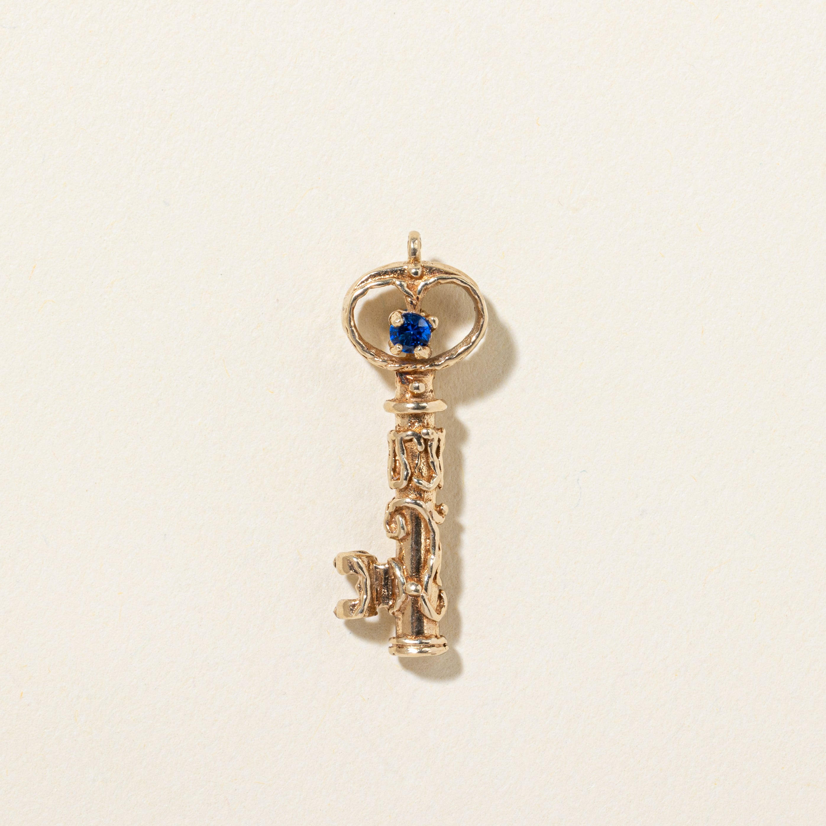 14k Synthetic Spinel Ornate Key Pendant | 0.04ctw