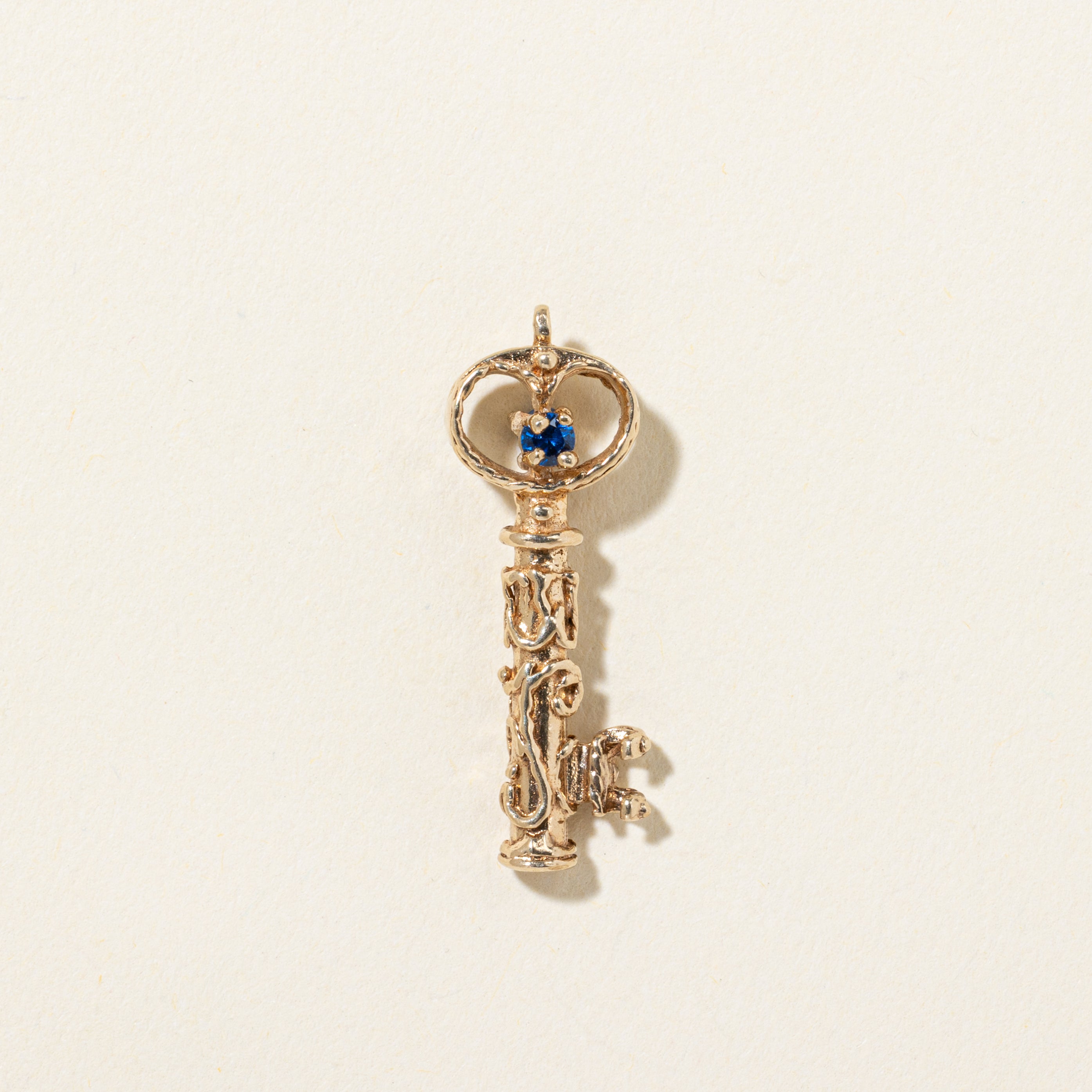 14k Synthetic Spinel Ornate Key Pendant | 0.04ctw