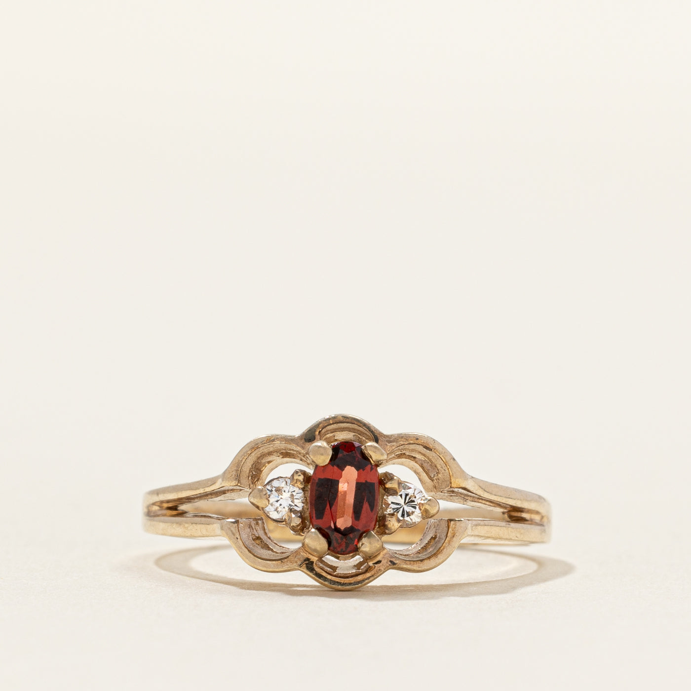 Oval Cut Garnet & Diamond Framed Ring | 0.03ctw | SZ 4.75