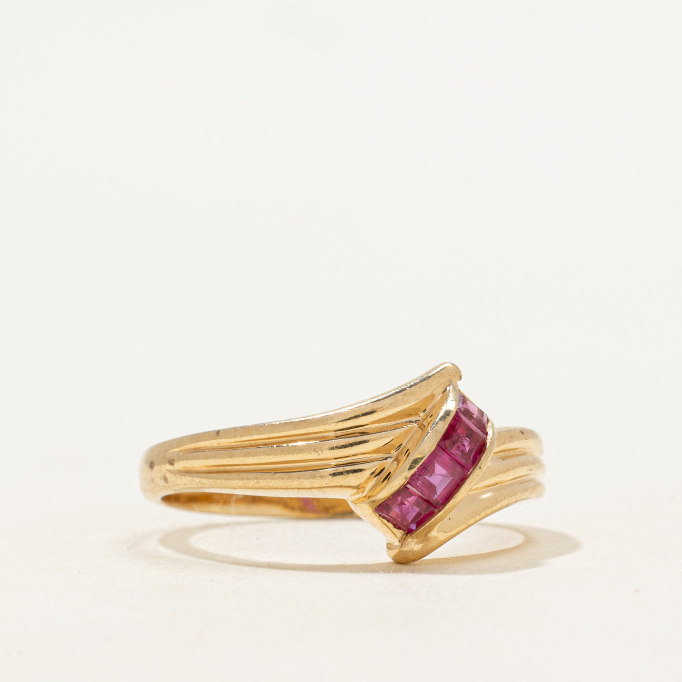 Channel Set Ruby Grooved Bypass Ring | SZ 6.5