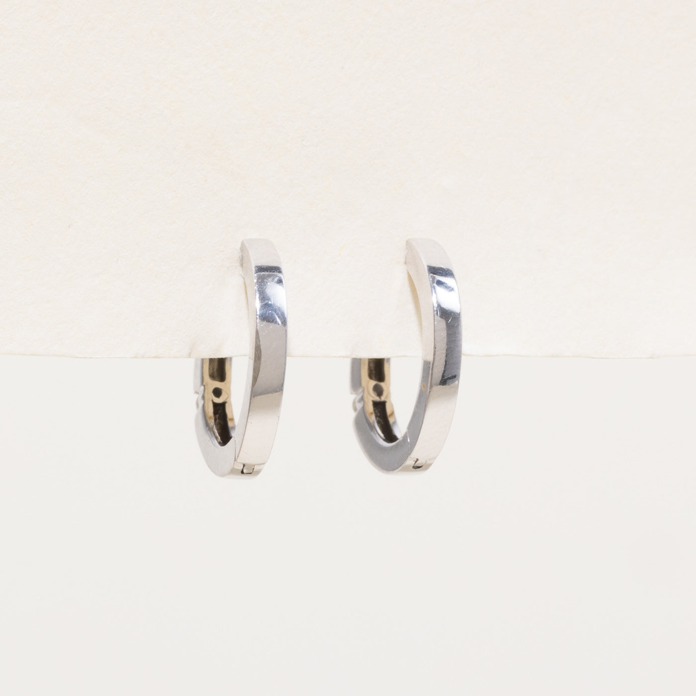 10k Single Diamond Huggie Earrings | 0.04ctw