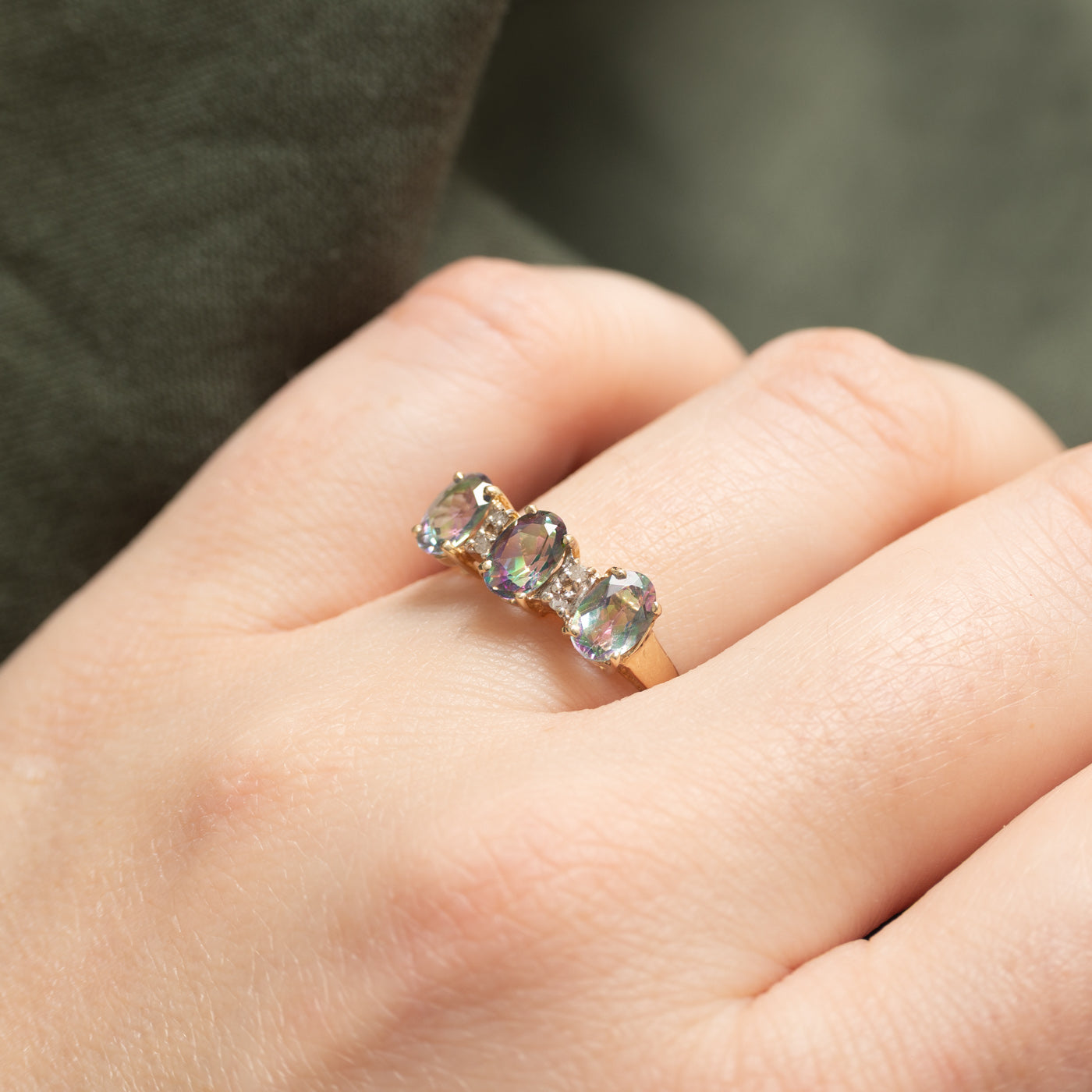 10K Three Stone Oval Cut Mystic Topaz & Diamond Ring | 1.50ctw, 0.03ctw | SZ 6.5