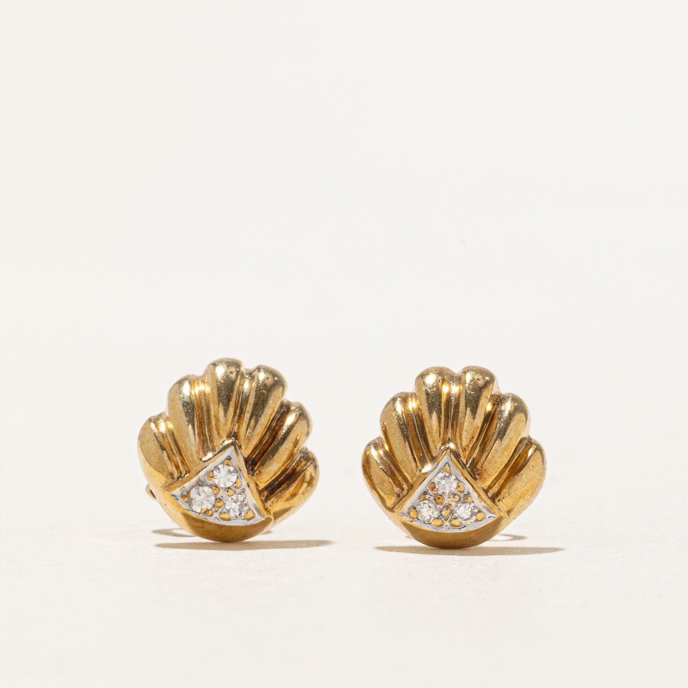 9k Diamond Shell Stud Earrings | 0.06ctw