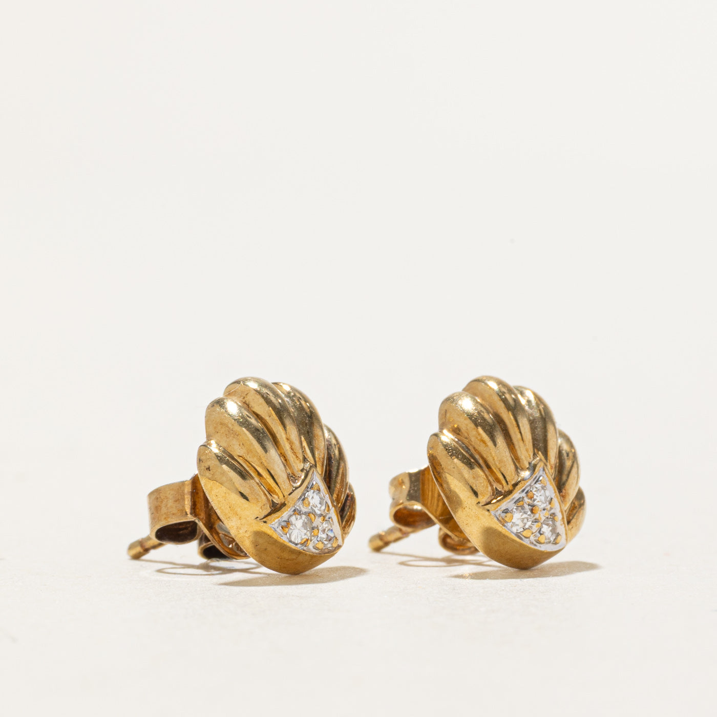 9k Diamond Shell Stud Earrings | 0.06ctw
