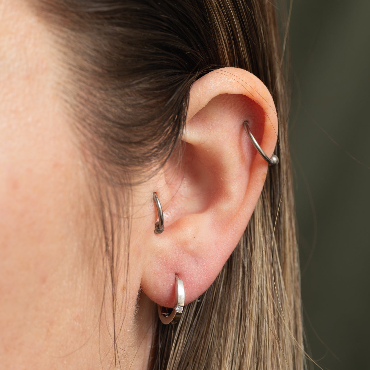 10k Single Diamond Huggie Earrings | 0.04ctw