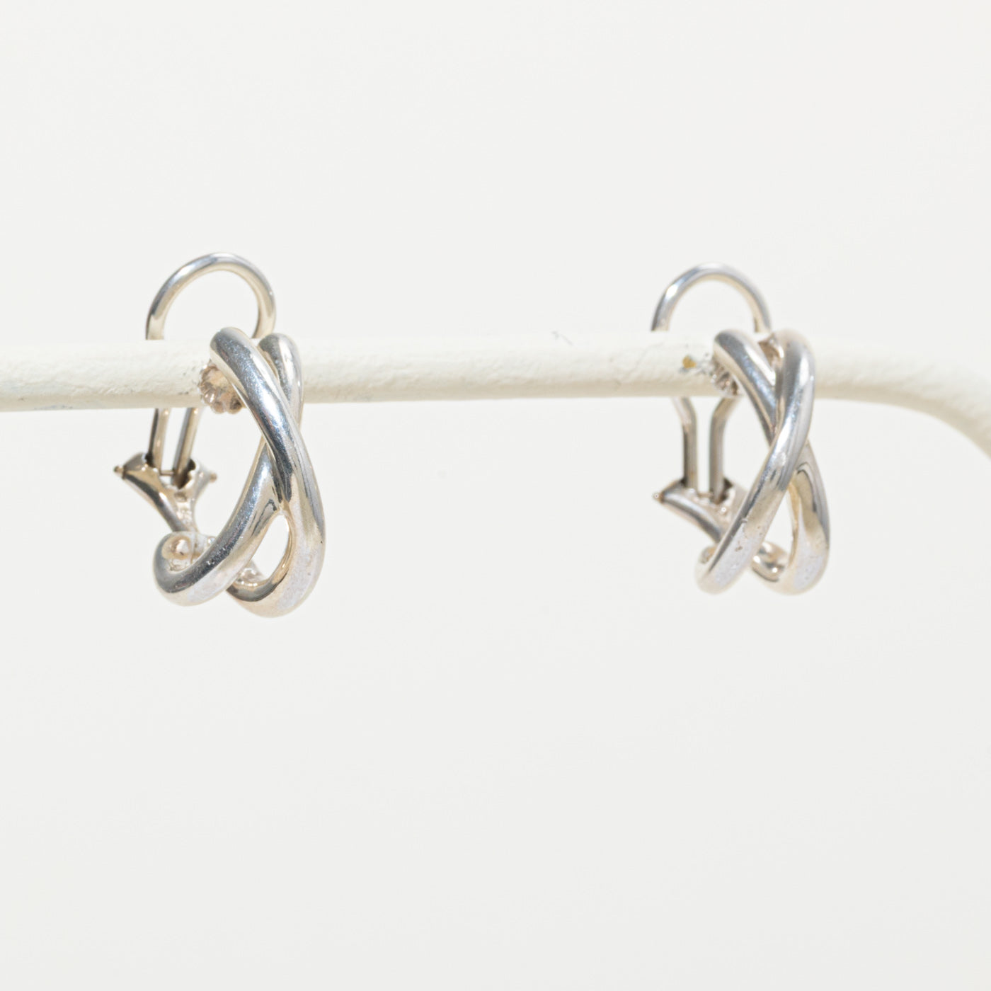 'Tiffany & Co.' Sterling Silver Cross Over Clip On Hoop Earrings