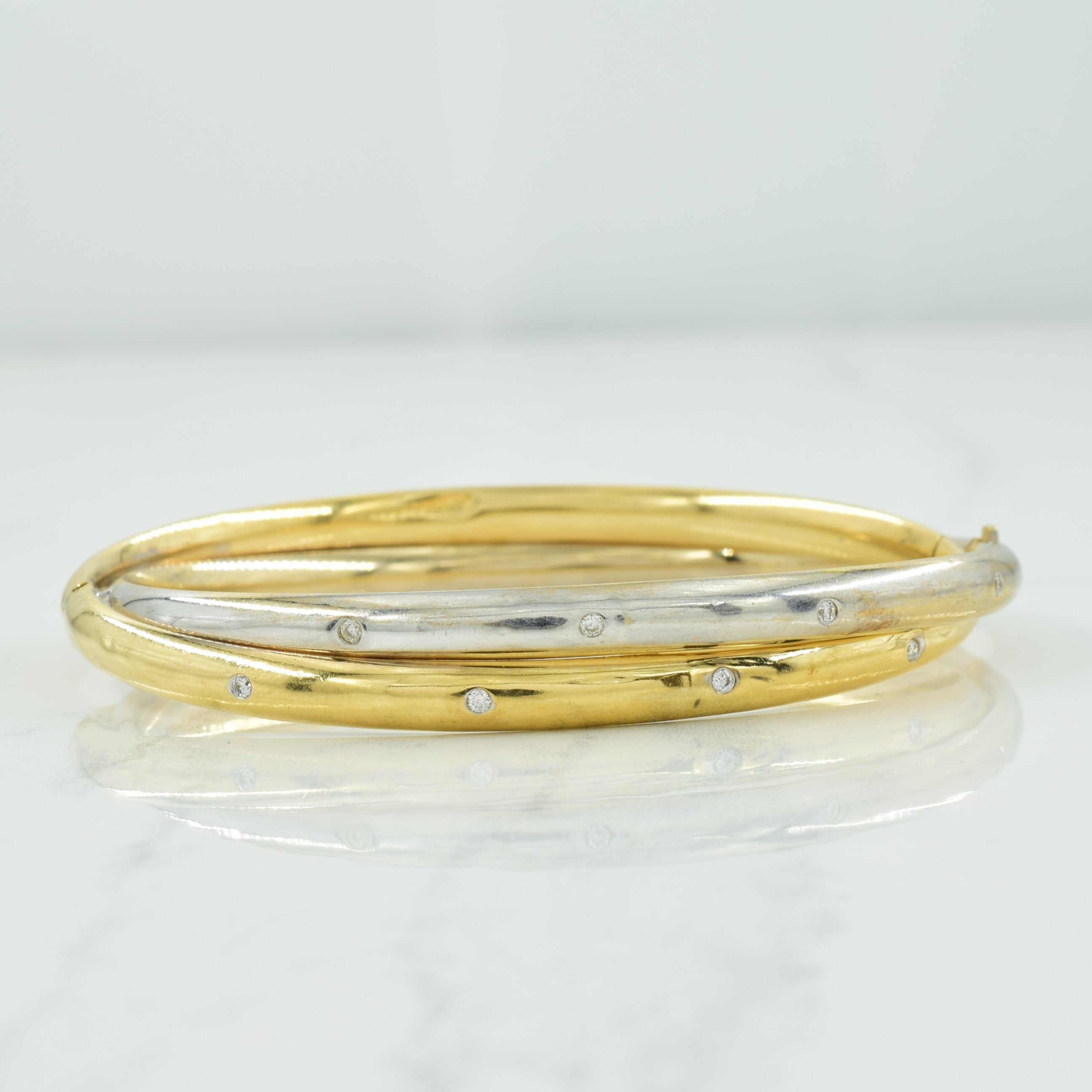 Bracelet en or bicolore 14 carats et diamants | 0,16 ct au total | 20 cm |