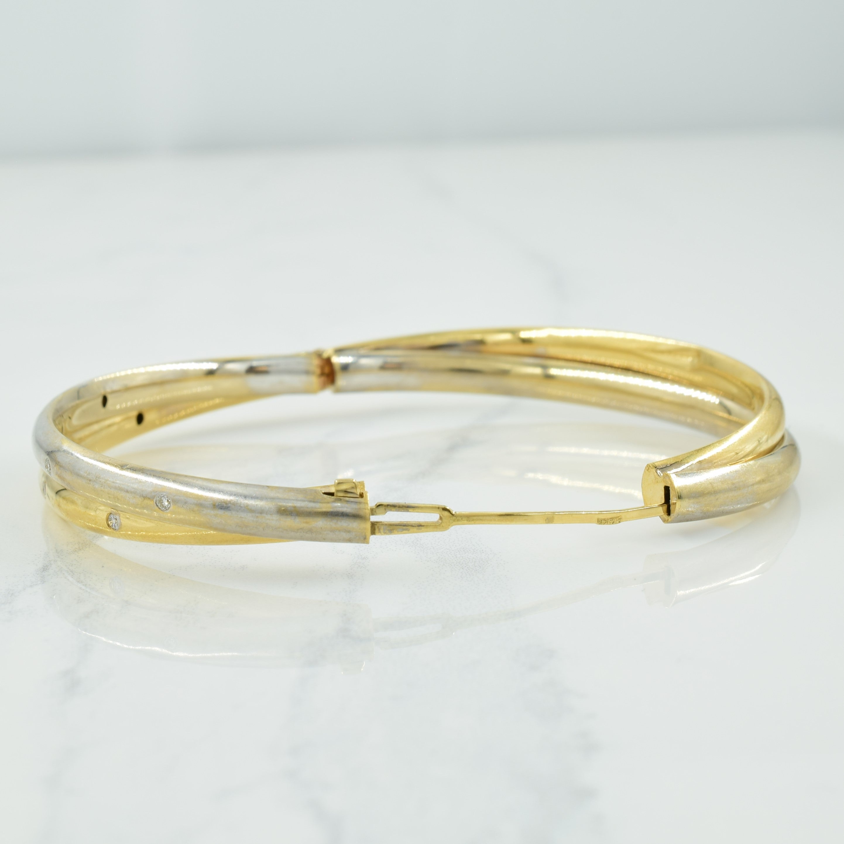 Bracelet en or bicolore 14 carats et diamants | 0,16 ct au total | 20 cm |