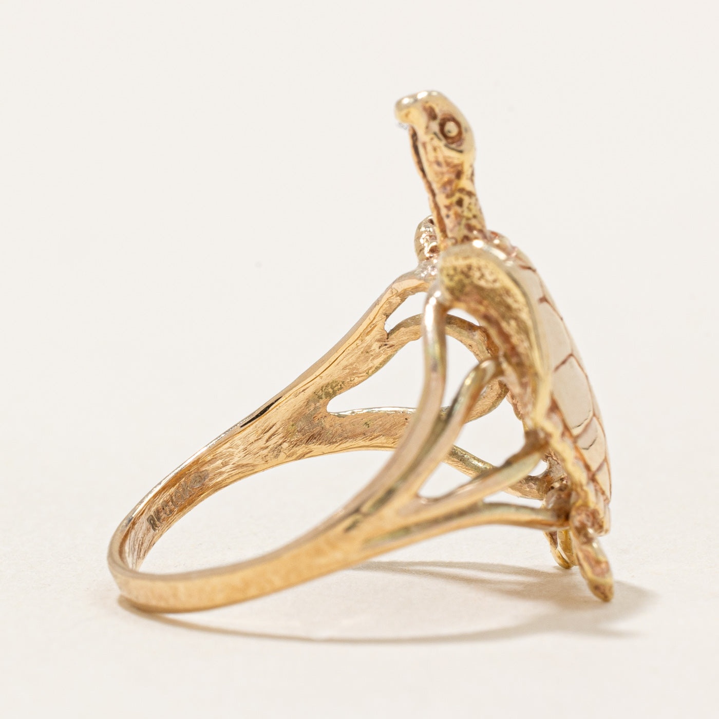 Bague tortue en or jaune 10 carats | Taille 4,5 |
