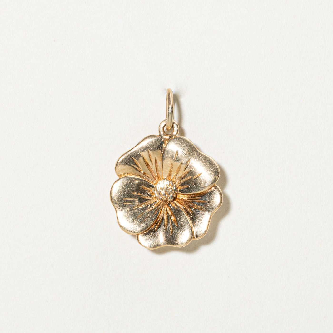 Pendentif fleur en or jaune 10 carats
