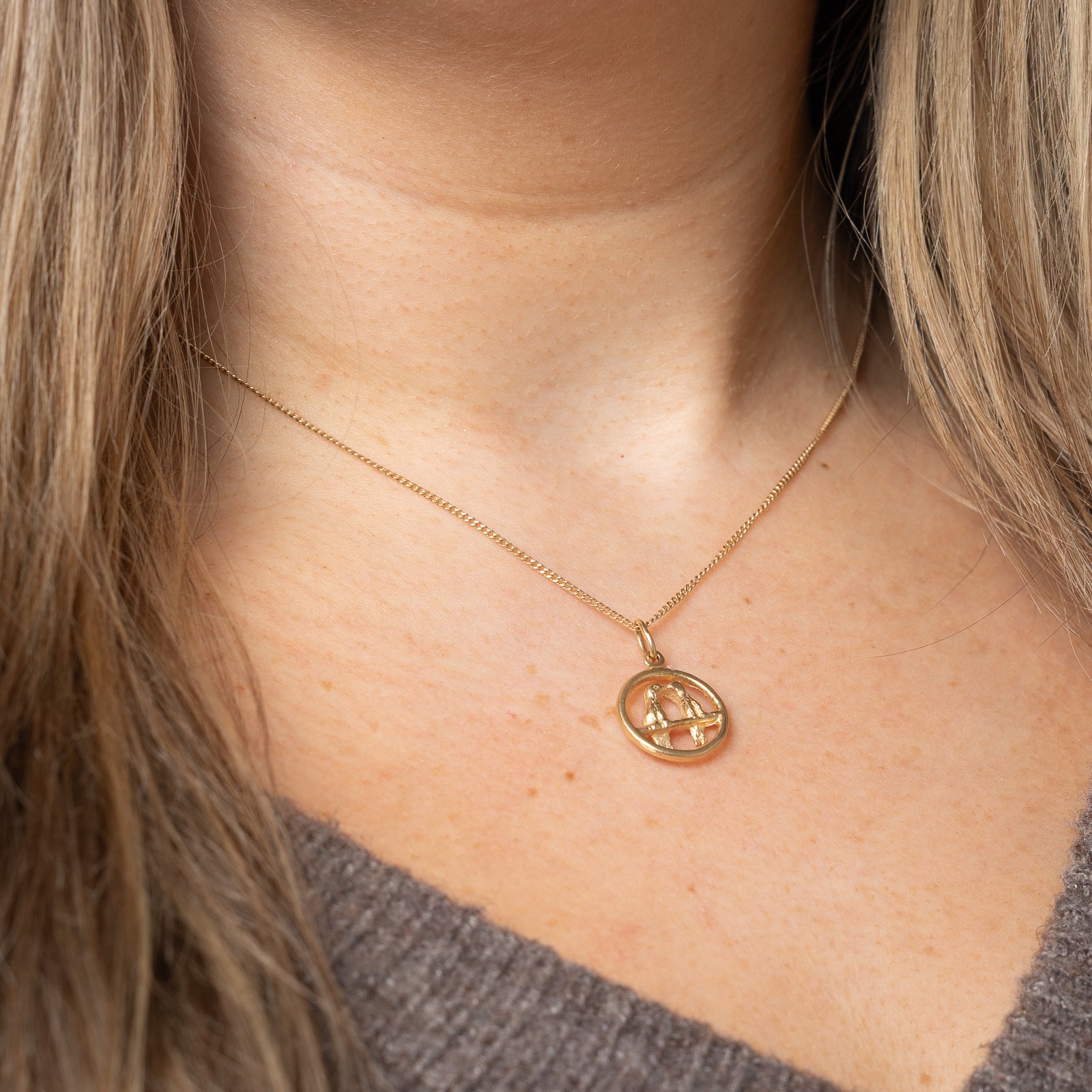 Breloque oiseau amoureux en or jaune 10 carats |