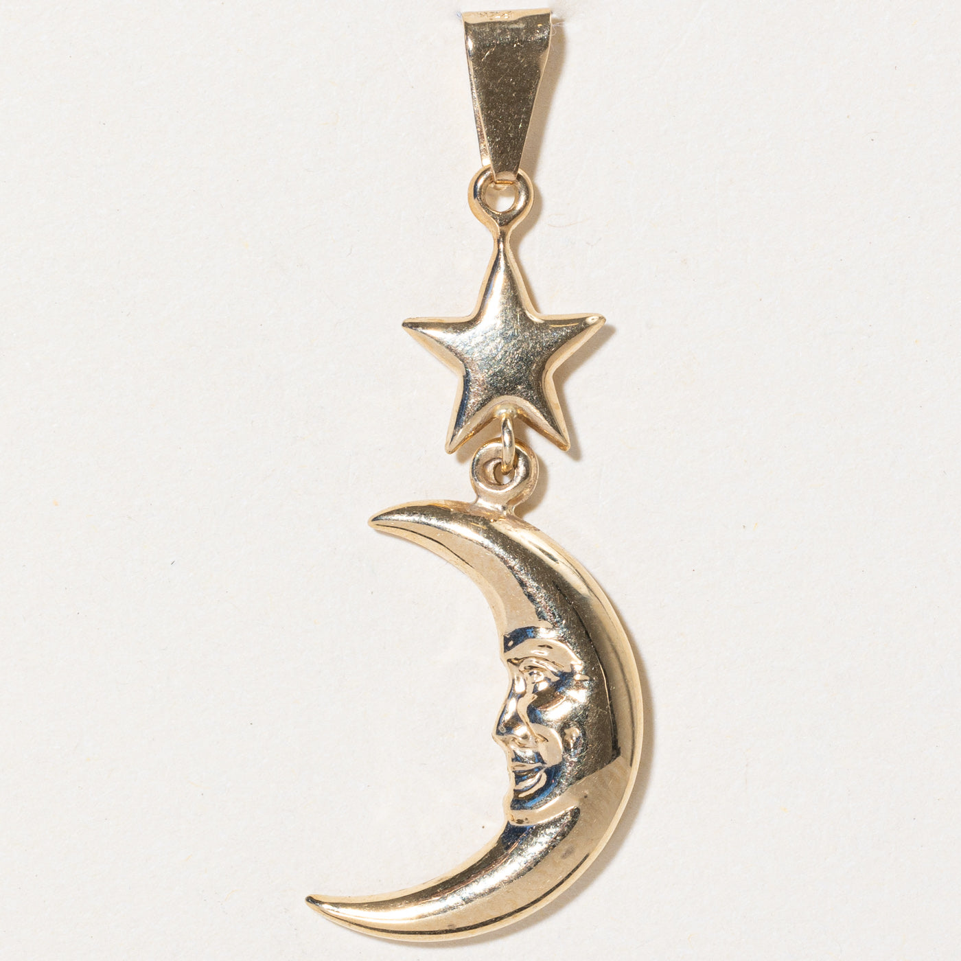 Pendentif lune et étoile en or jaune 14 carats