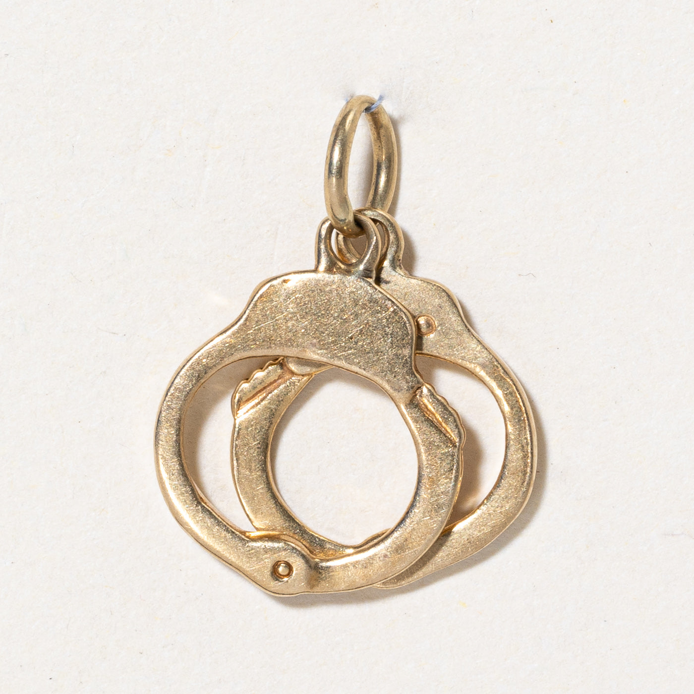 Breloque menottes en or jaune 18 carats