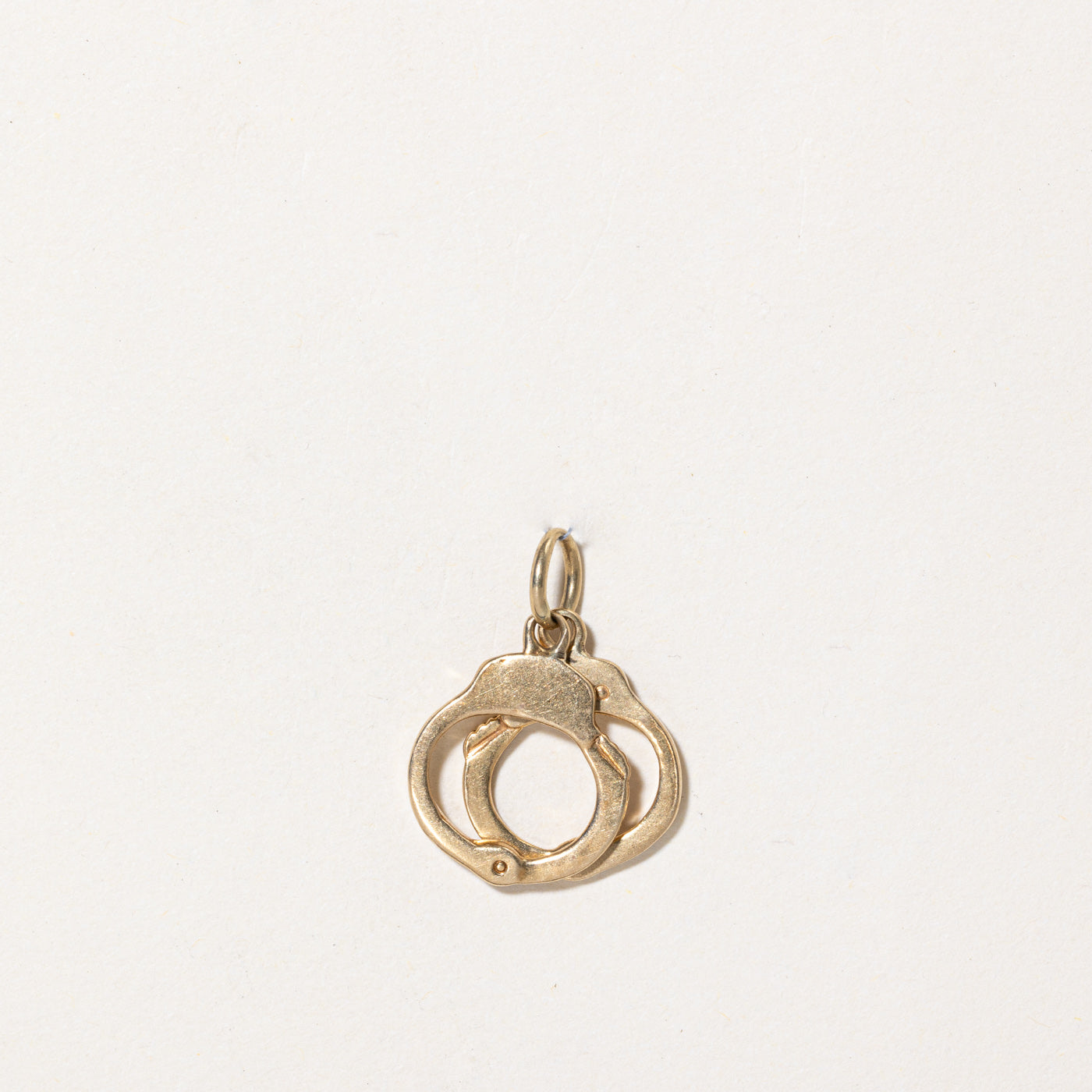 Breloque menottes en or jaune 18 carats