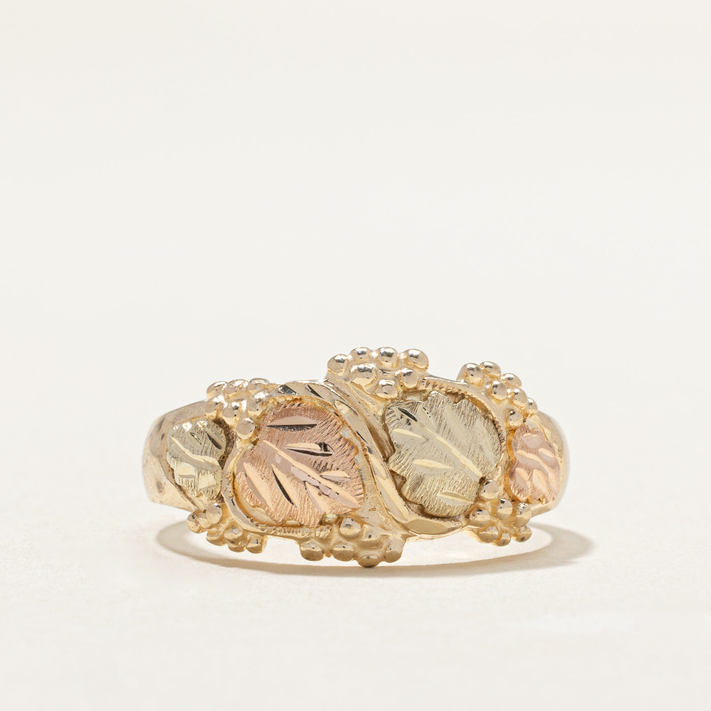 Bague bicolore en or 10 carats à motif de feuilles | Taille 8,5