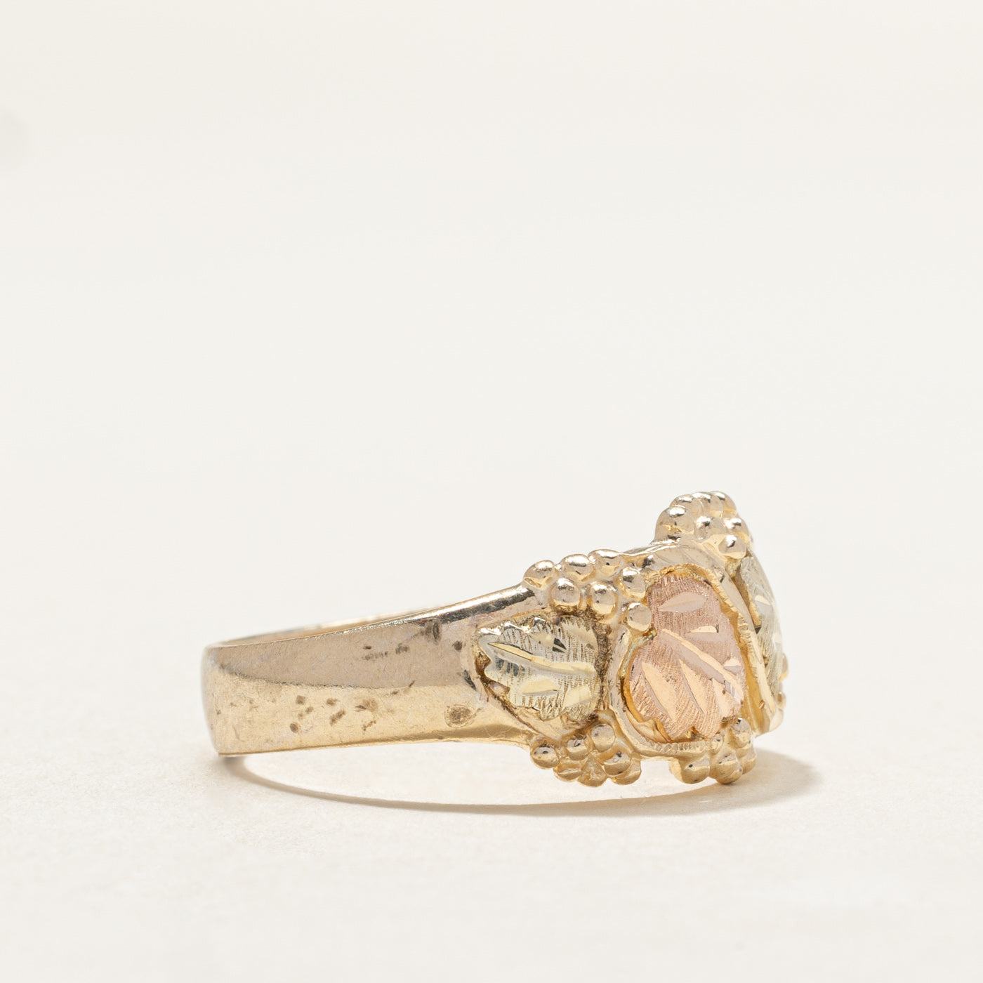 Bague bicolore en or 10 carats à motif de feuilles | Taille 8,5