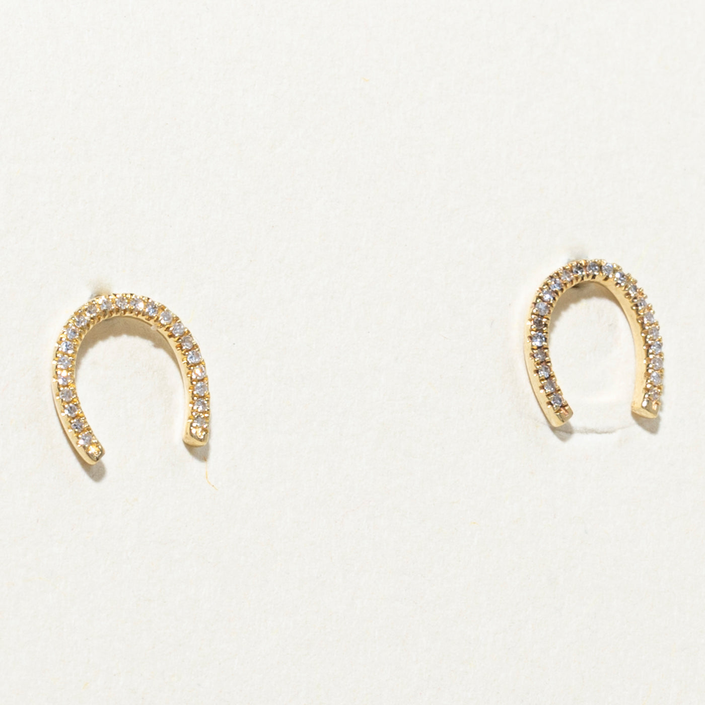 Boucles d'oreilles puces en forme de fer à cheval serties de diamants 10 carats | 0,06 ct au total