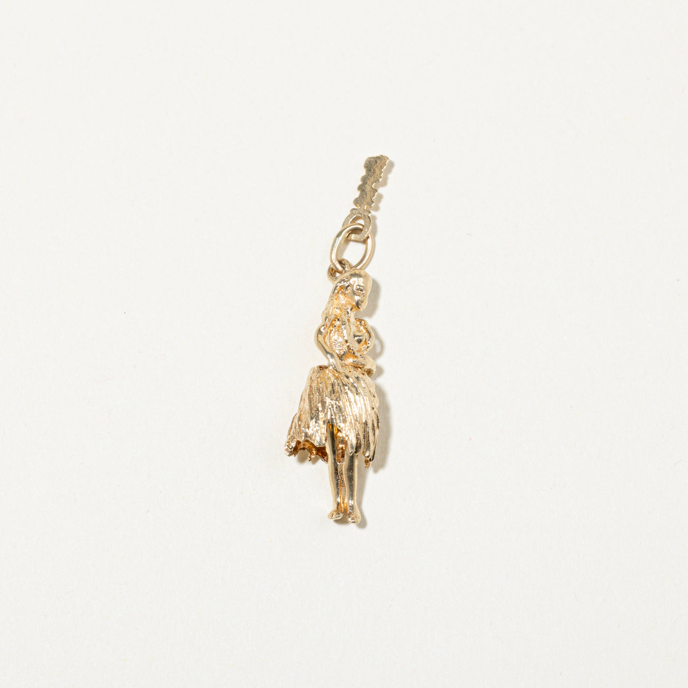 Breloque danseuse de hula en or jaune 12 carats