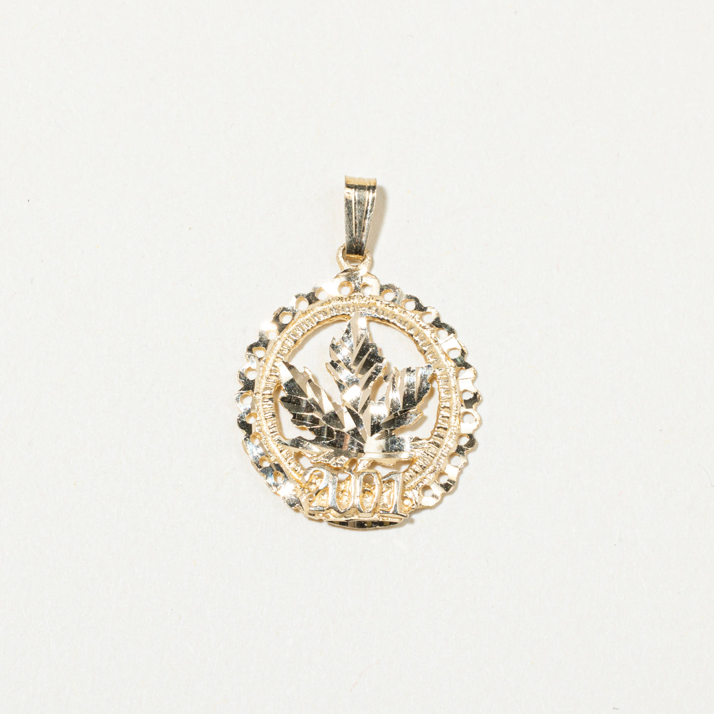 10k Yellow Gold "2001" Maple Leaf Pendant