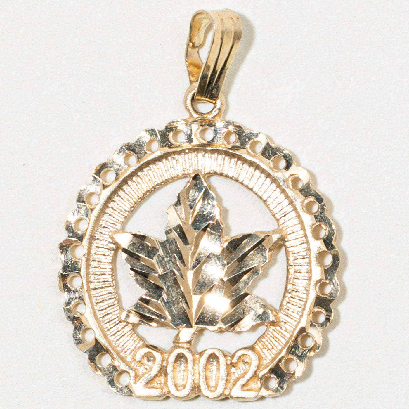 10k Yellow Gold Year 2002 Maple Leaf Charm