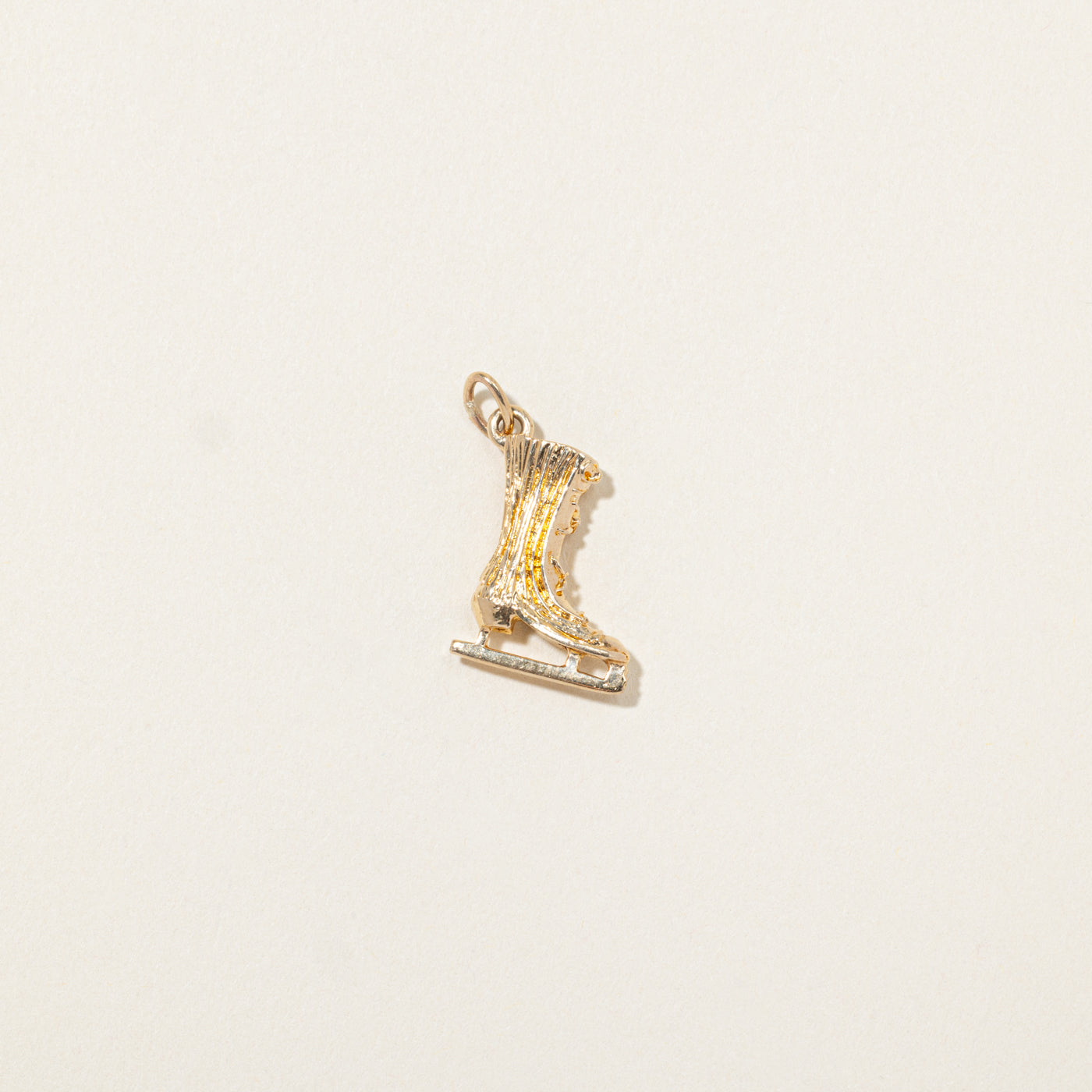 Breloque patin à glace en or jaune 14 carats