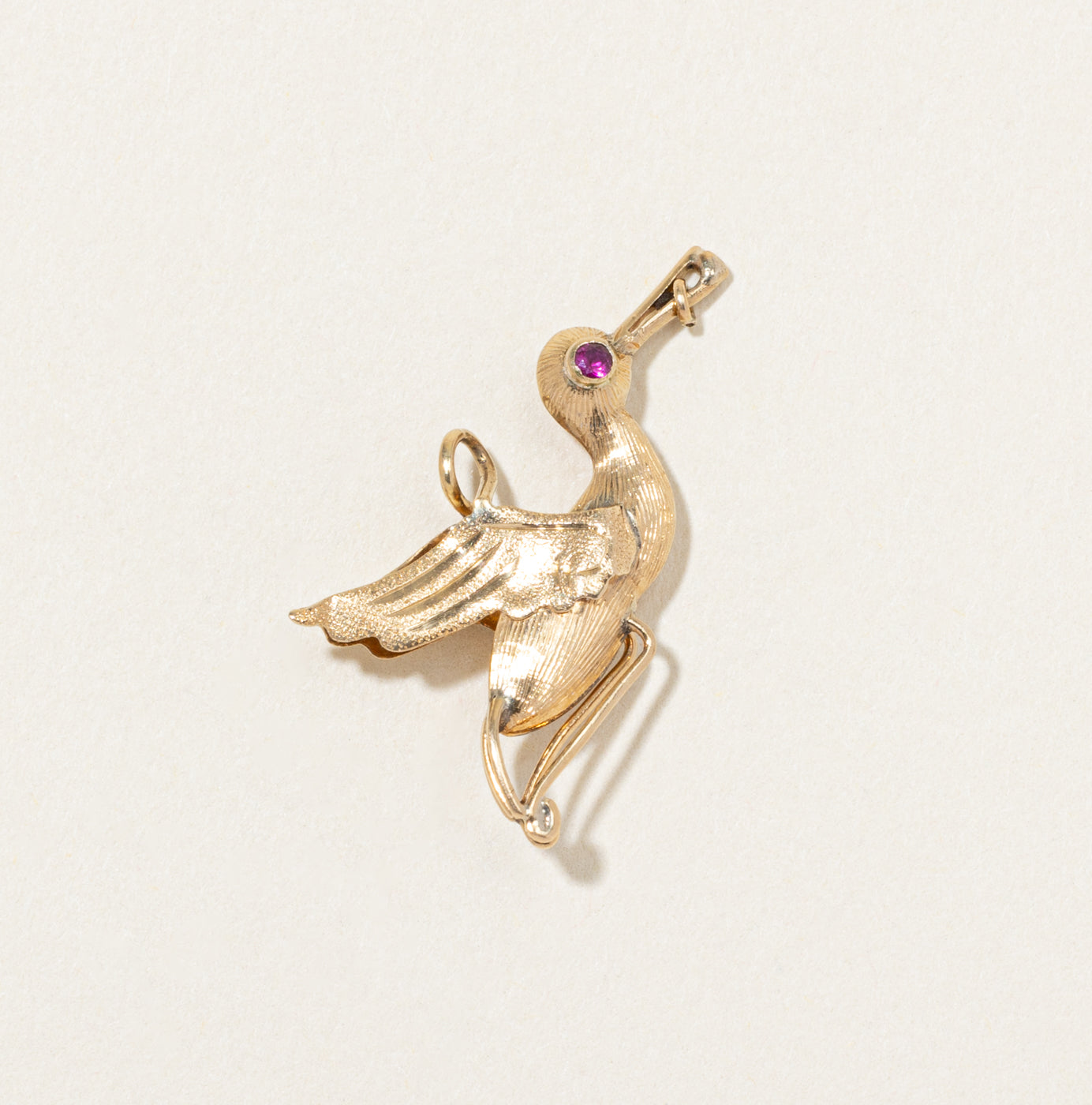 Breloque cigogne en or jaune 17 carats