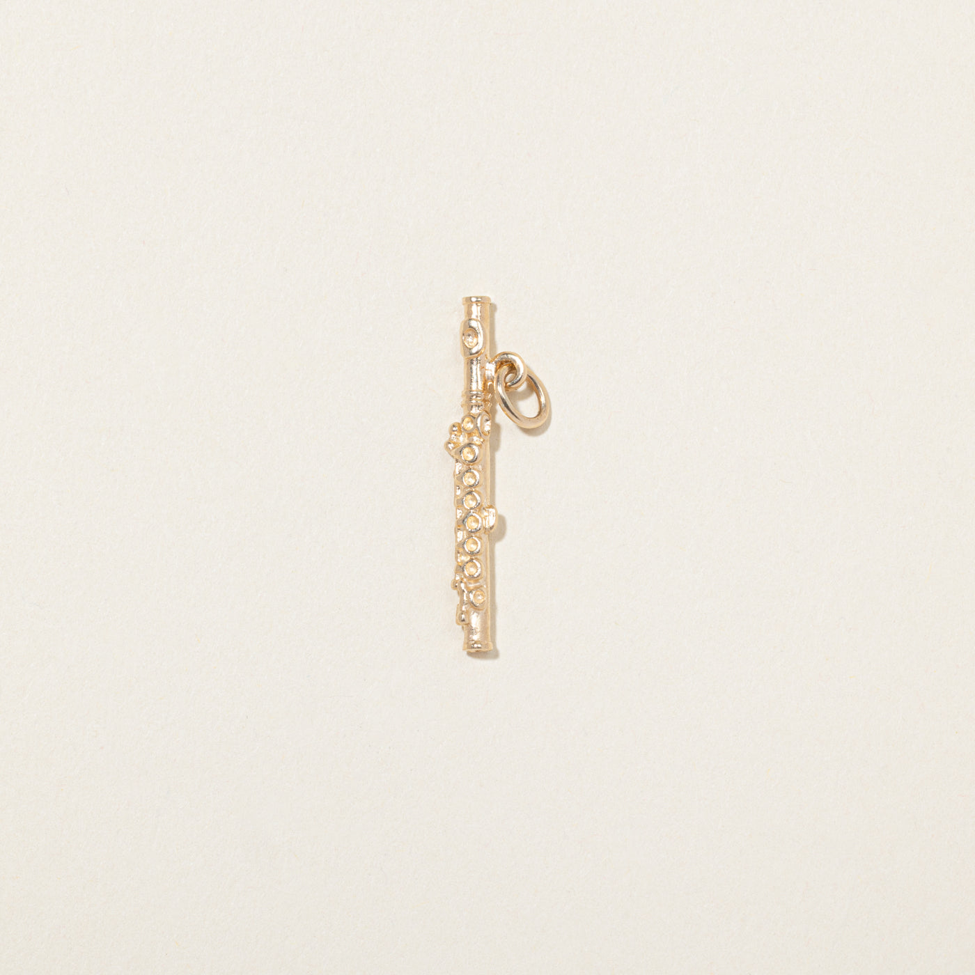 Breloque flûte en or jaune 10 carats