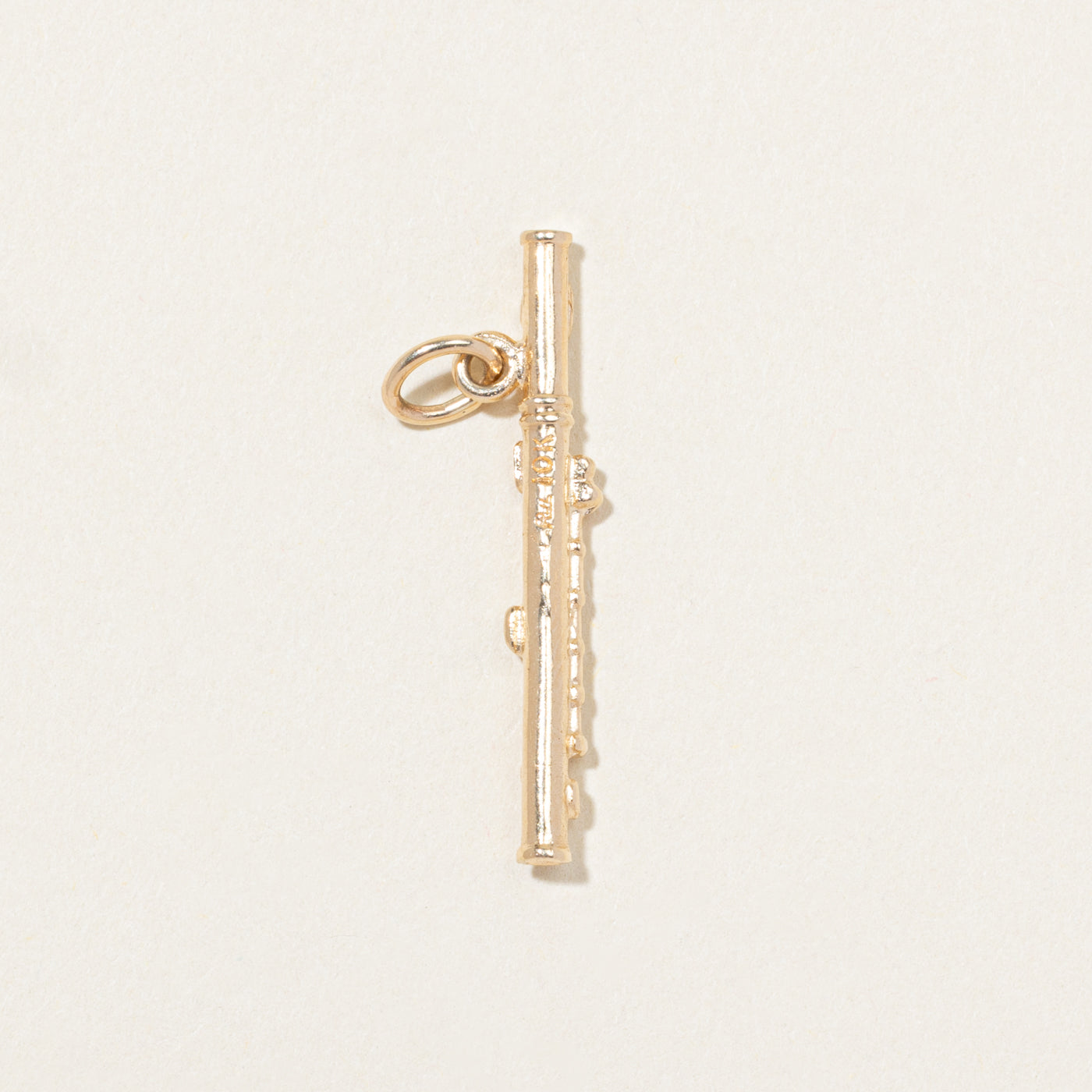 Breloque flûte en or jaune 10 carats