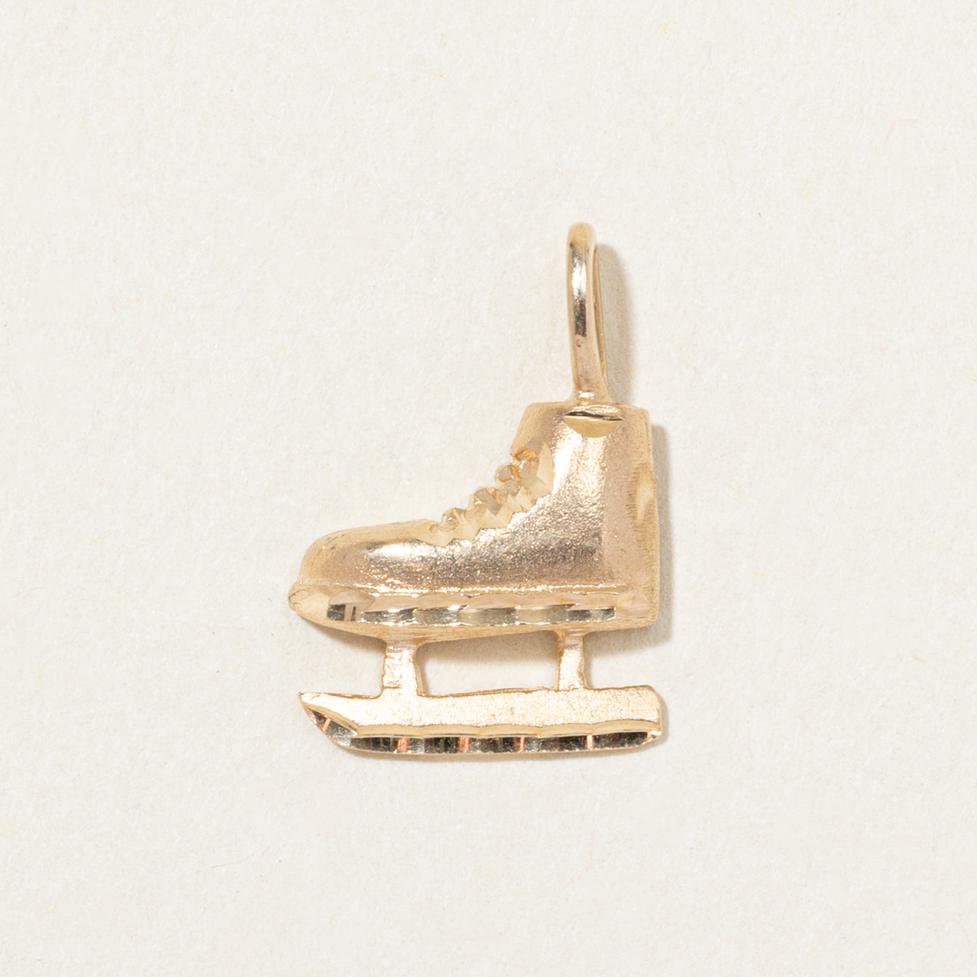Breloque patin à glace en or jaune 10 carats