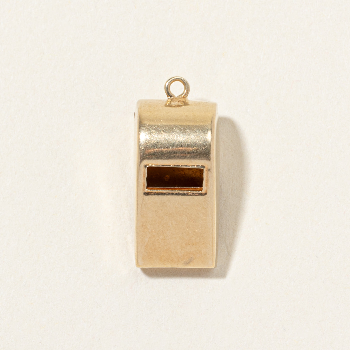 Breloque sifflet en or jaune 13 carats